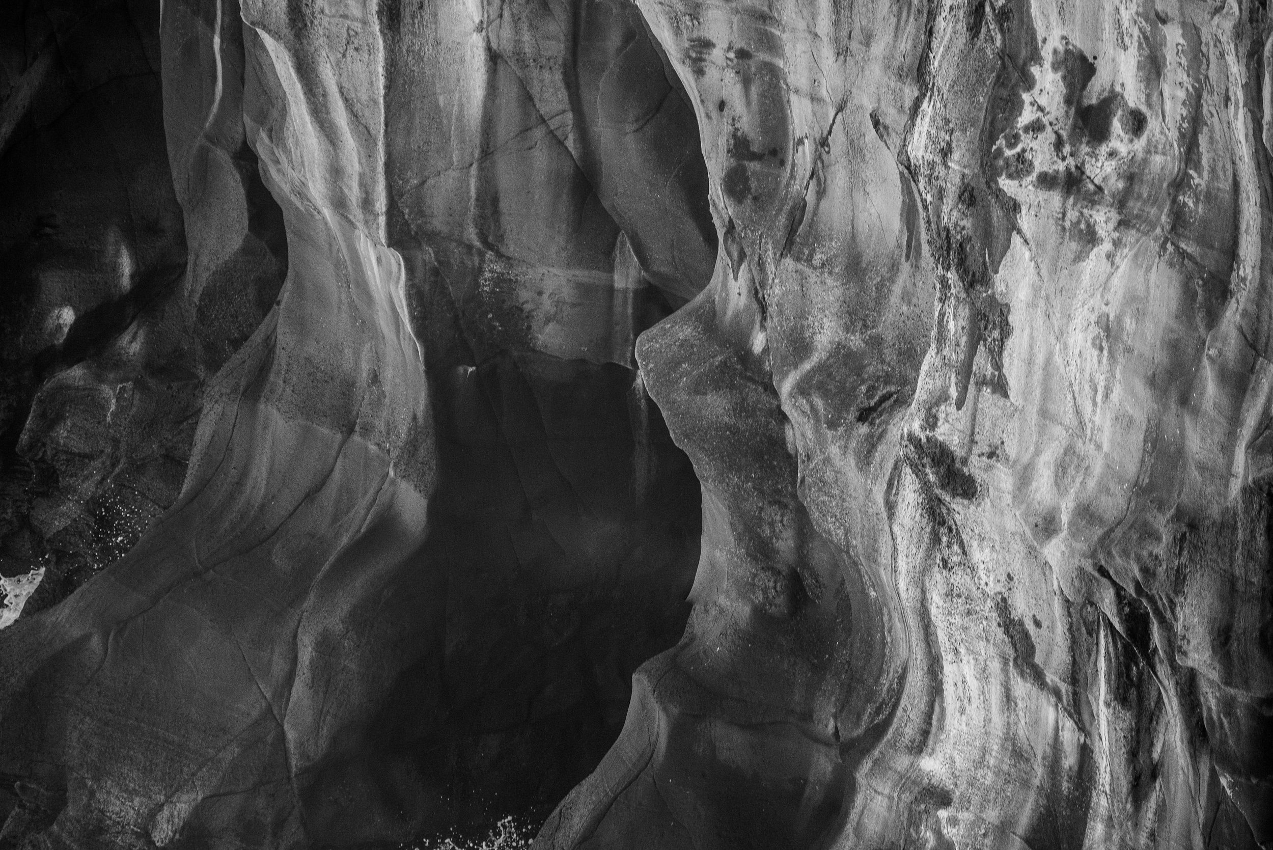 Black and white abstract patterns on rock formations