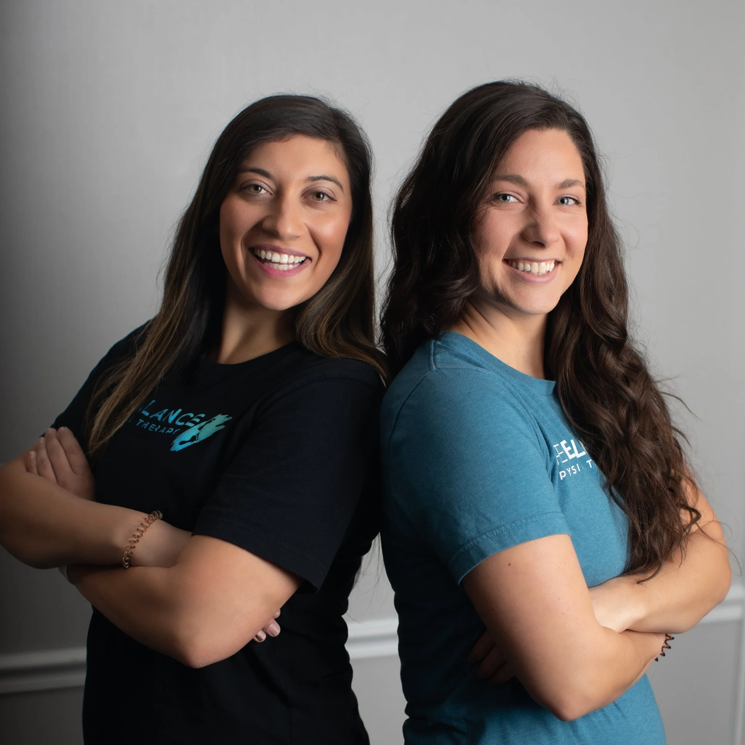 Adi Blaj and Kat Orr owners of rebalance physical therapy smiling as they treat vertigo, dizziness, and concussions