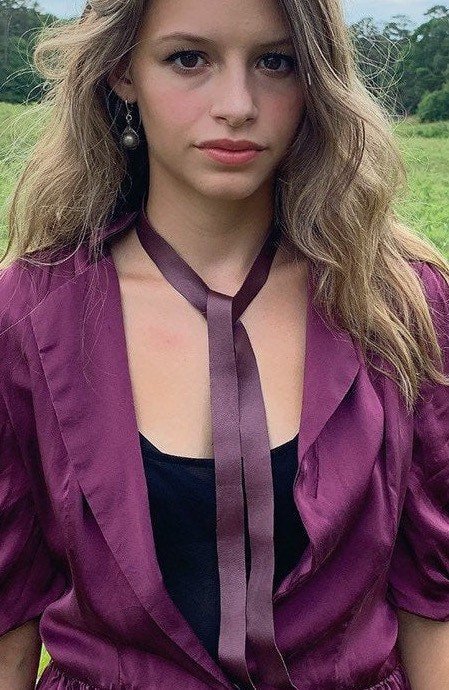 ALEX Snake Wrap Model Wearing Around Neck