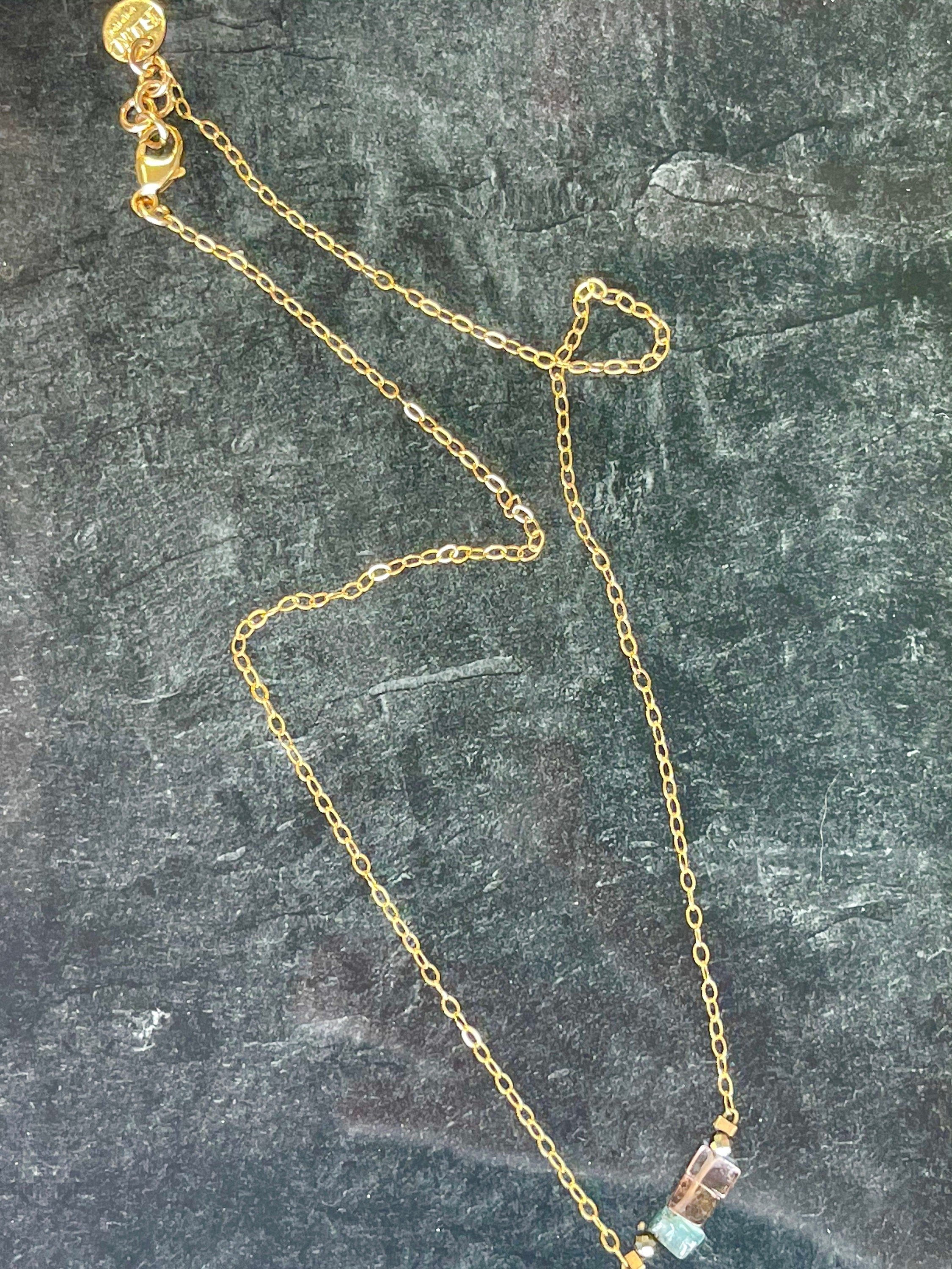 ELOISE Necklace Top View Black Background