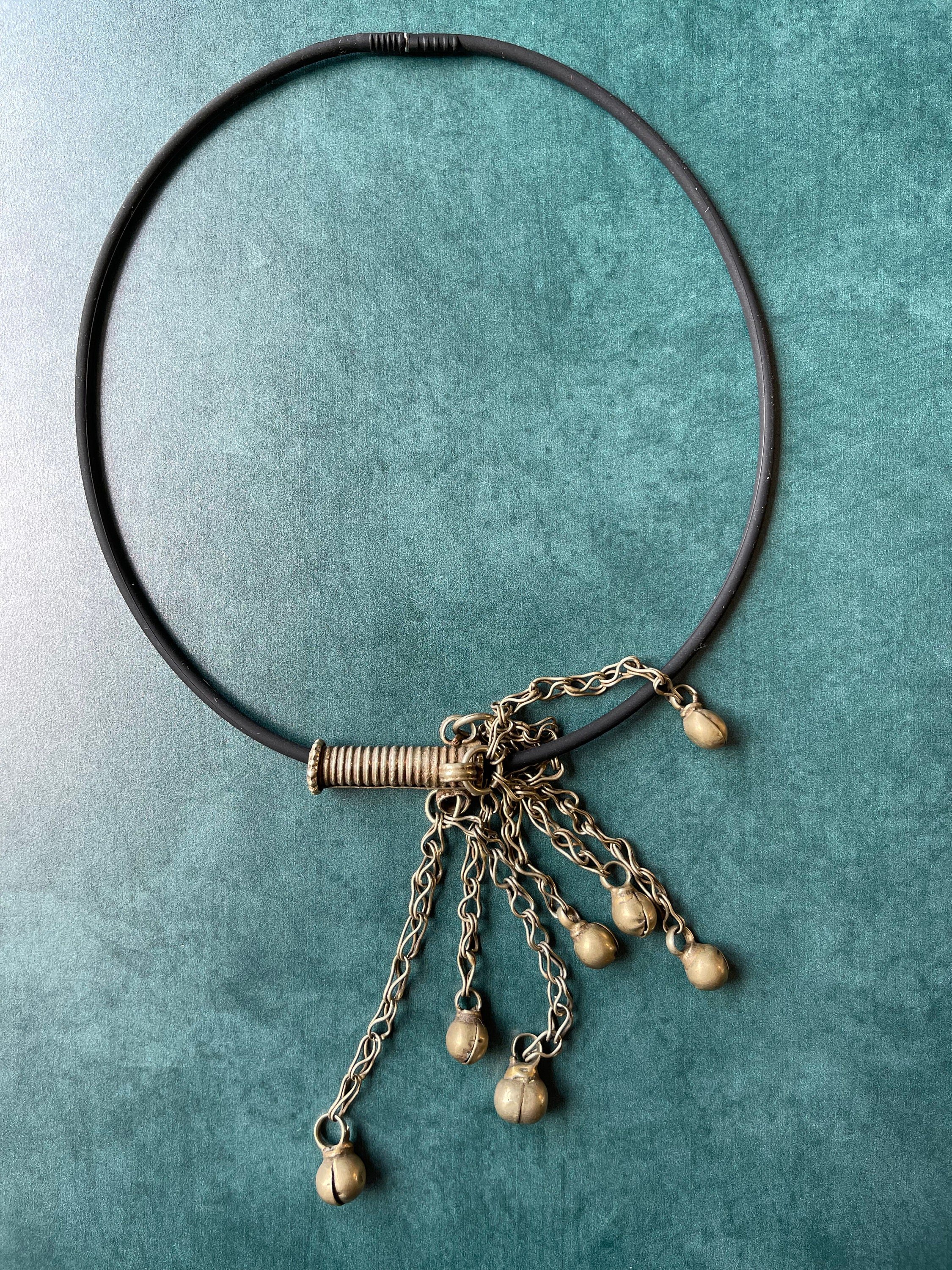 SPENCER'S BROTHER Necklace Top View Blue Background