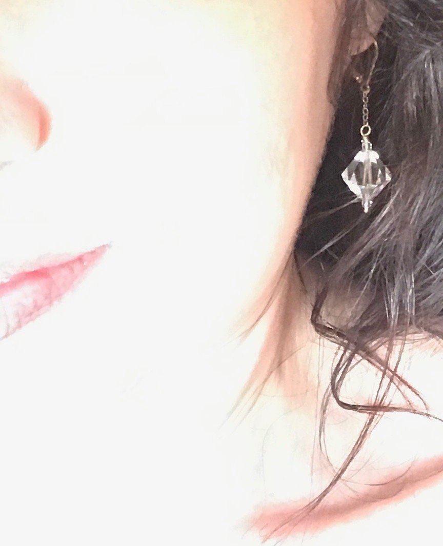 FIONA Flutter Earrings Model Wearing Up Close