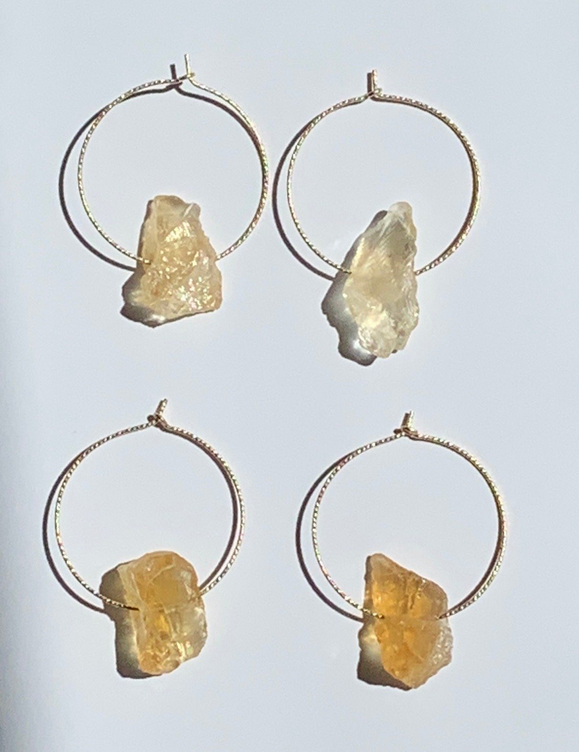 AUGUST Earrings Top View White Background