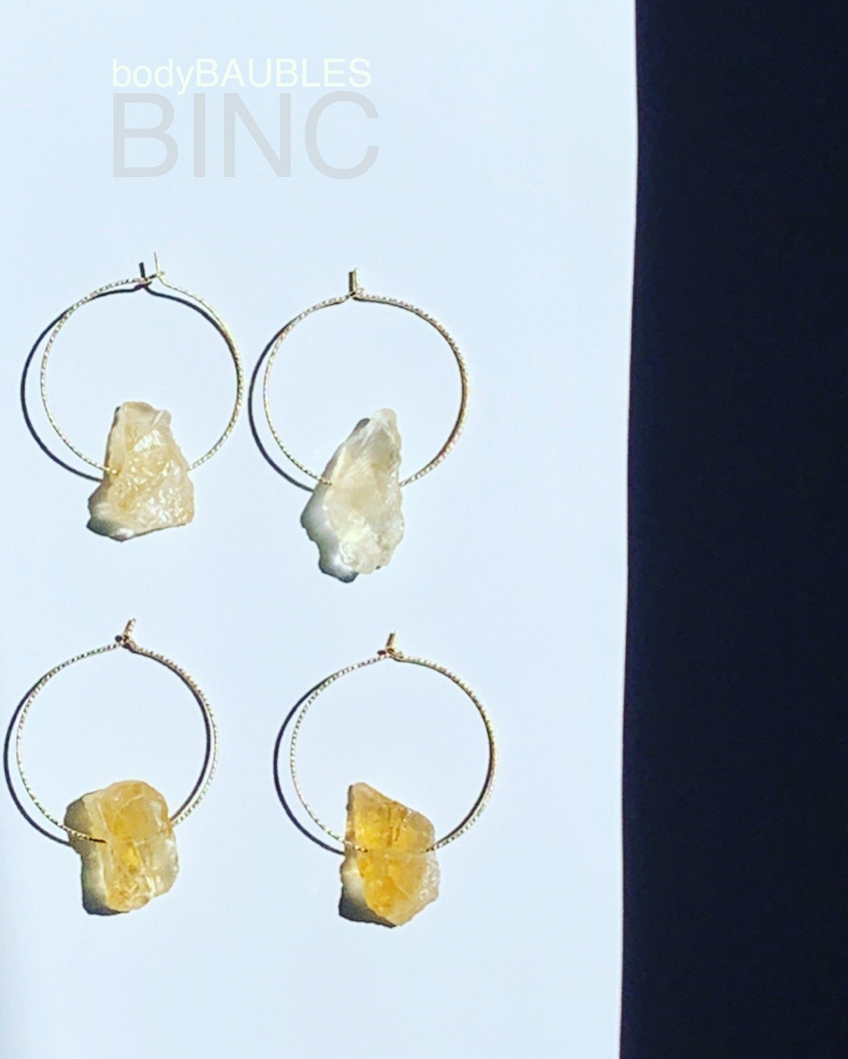 AUGUST Earrings Top View White Background