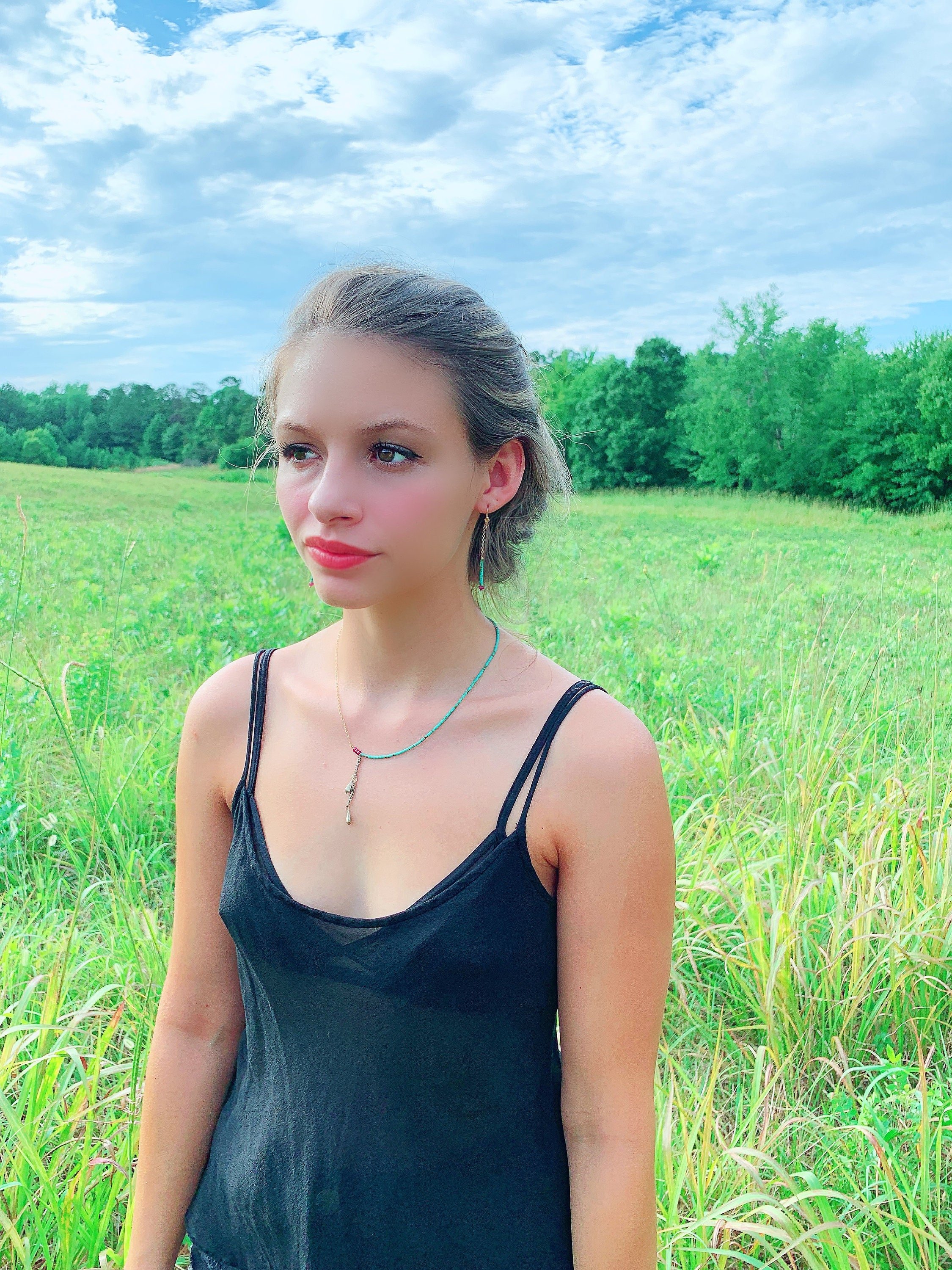 SOPHIE Drop Earrings Model Wearing From Angle