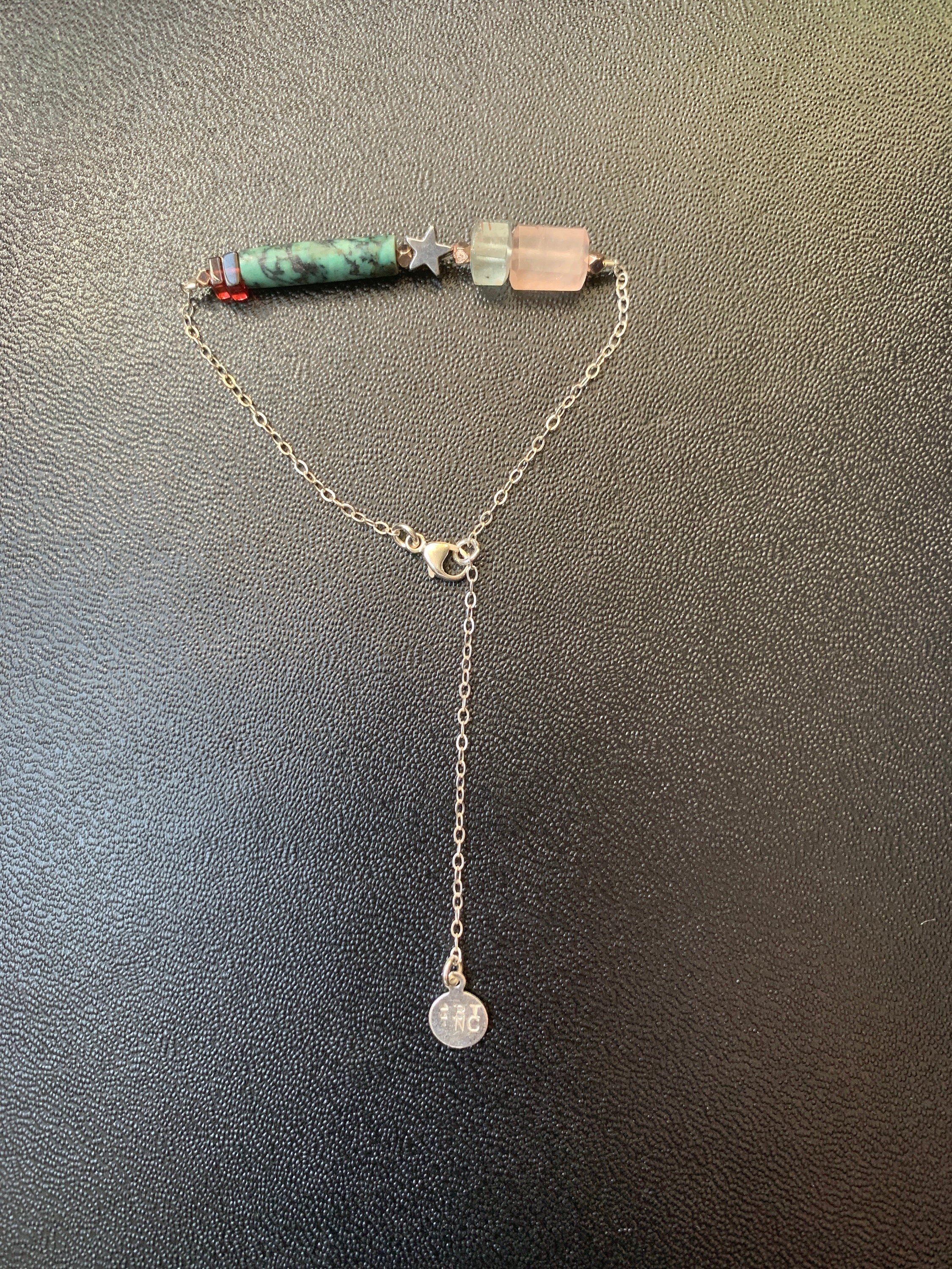 ANXIETY (Release Me) Bracelet Hanging On Display