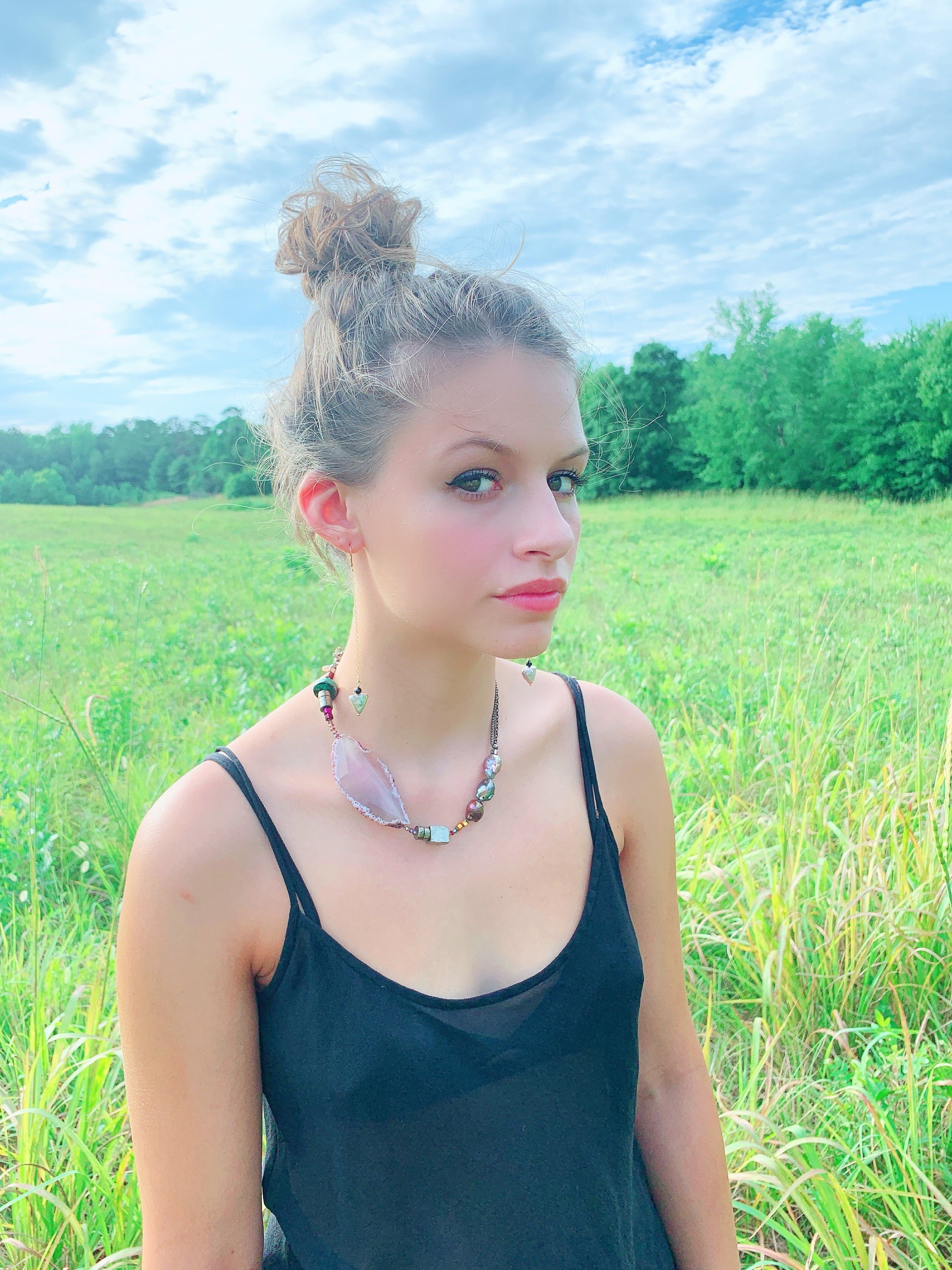 AMAYA Earrings Model Wearing Side View