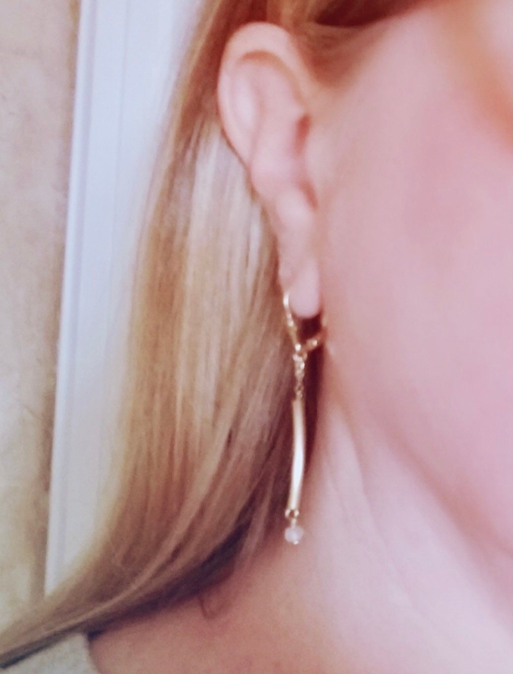 AXEL Earrings Model Wearing Up Close