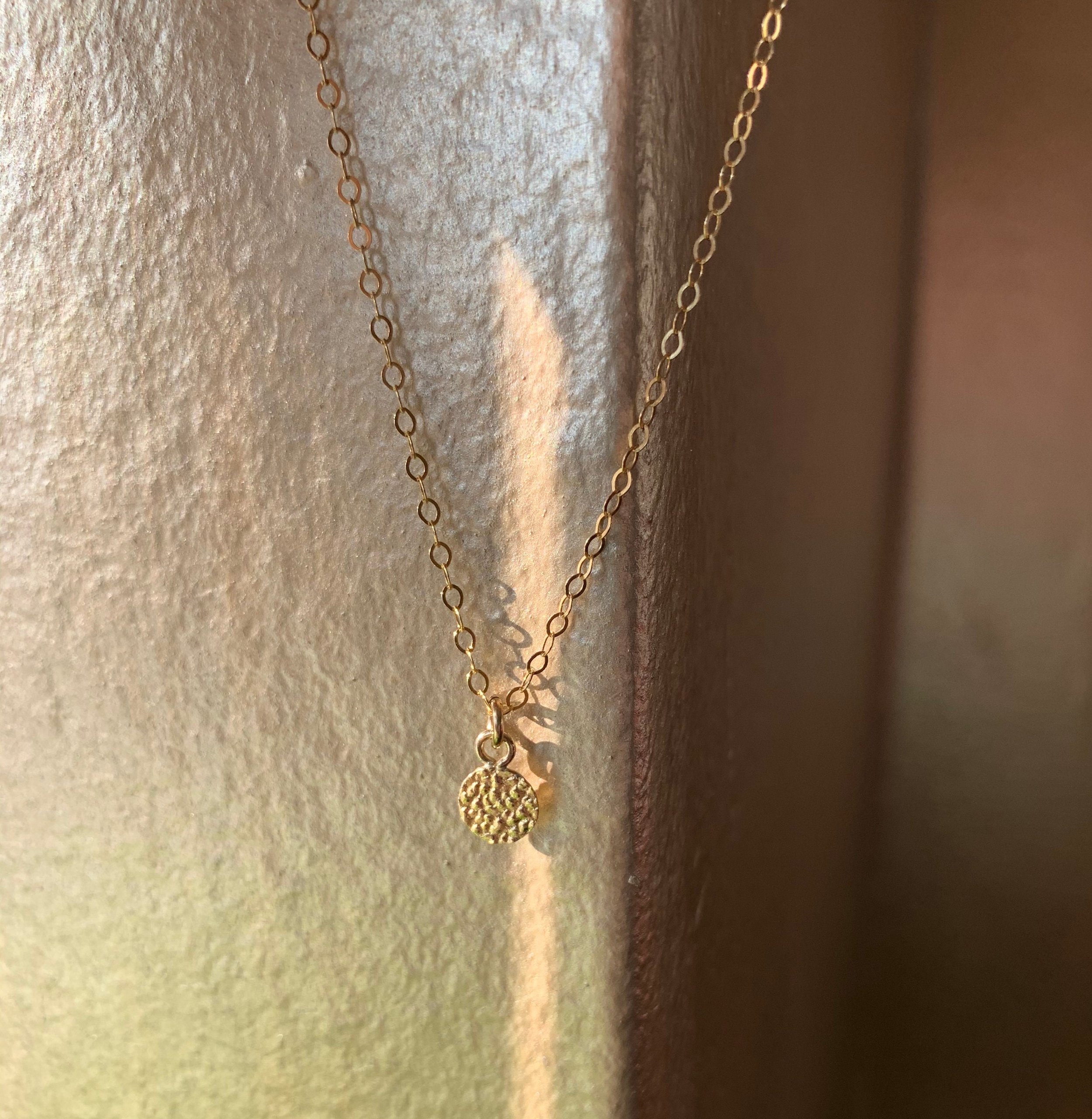 ELIO SUNGOD Necklace On Display