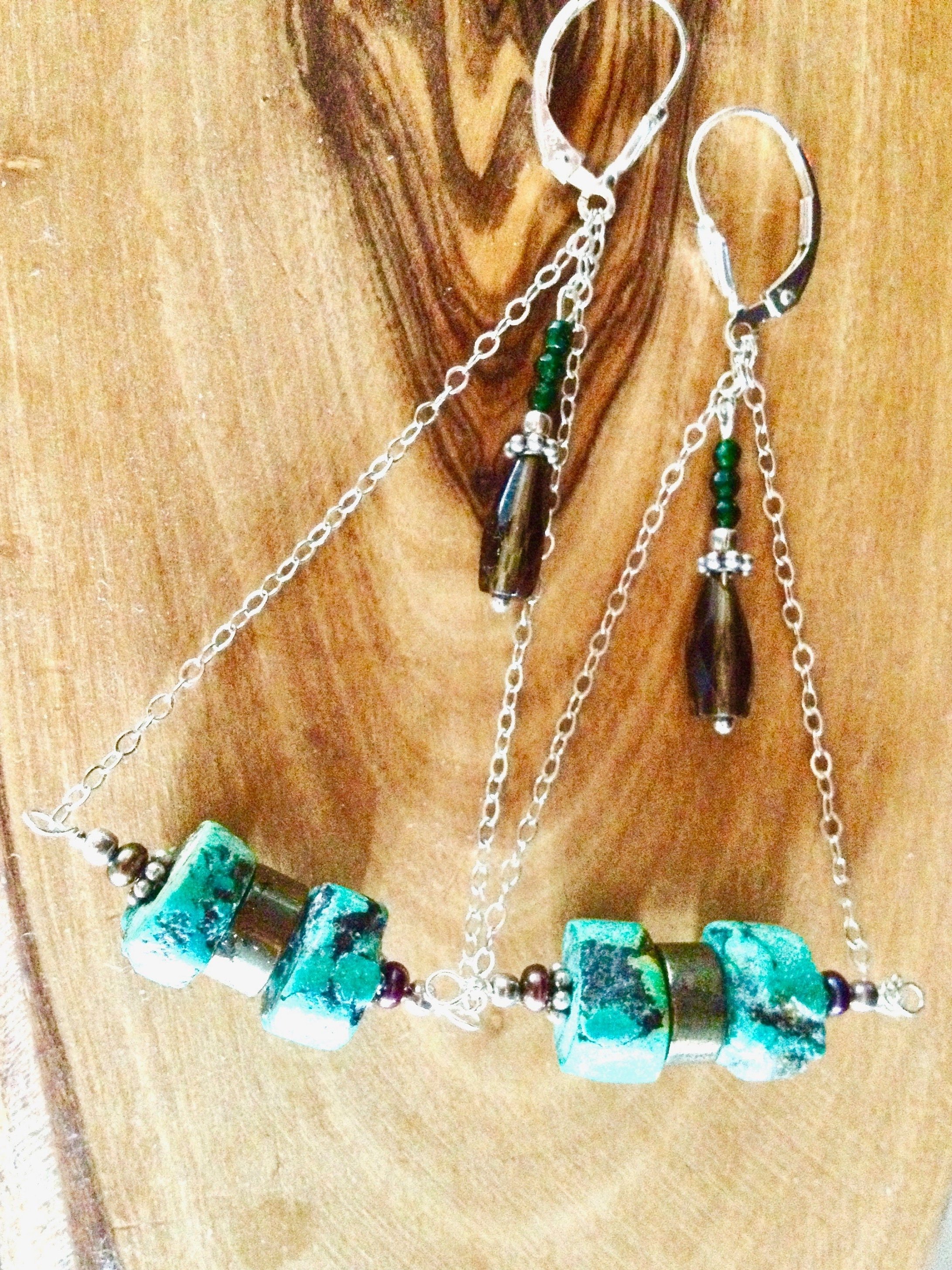 KELLY Egyptian Inspired Tiered Earrings On Display