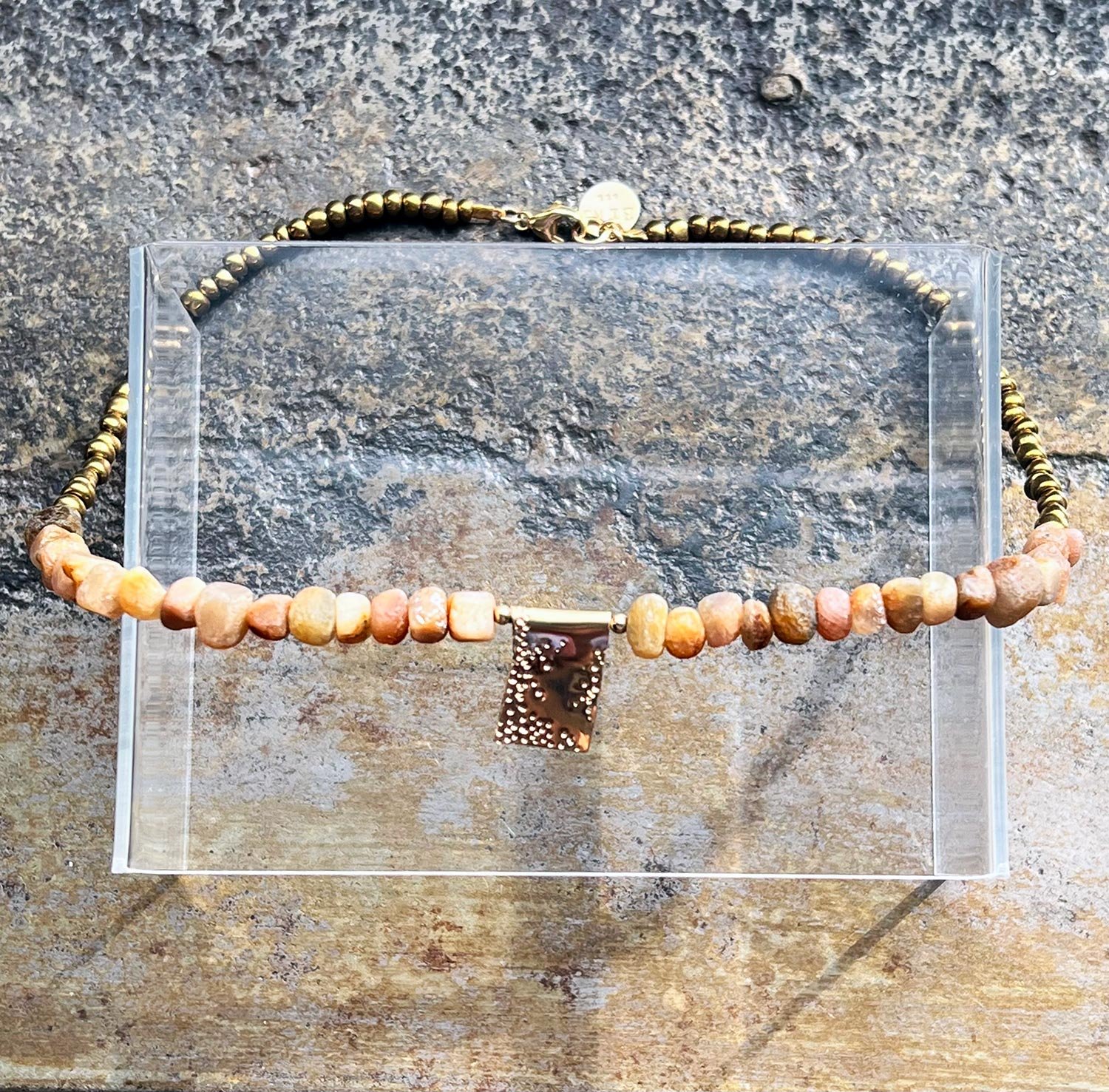 LOGAN Yellow Sapphire 14K Gold Pendant Necklace On Display