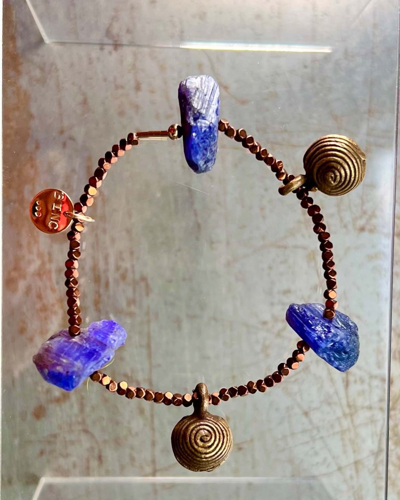 SAGA tanzanite bracelet scattered stone top view
