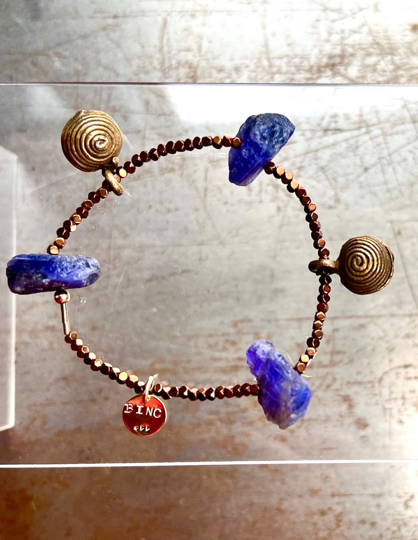 SAGA tanzanite bracelet scattered stone side