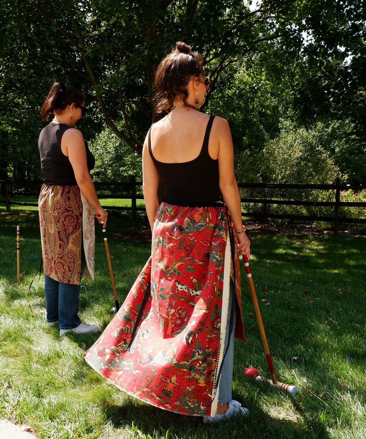 Piper overskirts on models back view playing croquet
