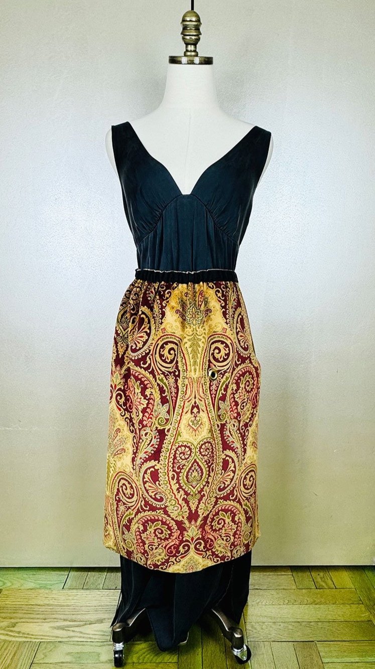 Piper overskirt on mannequin front view ribbon detail