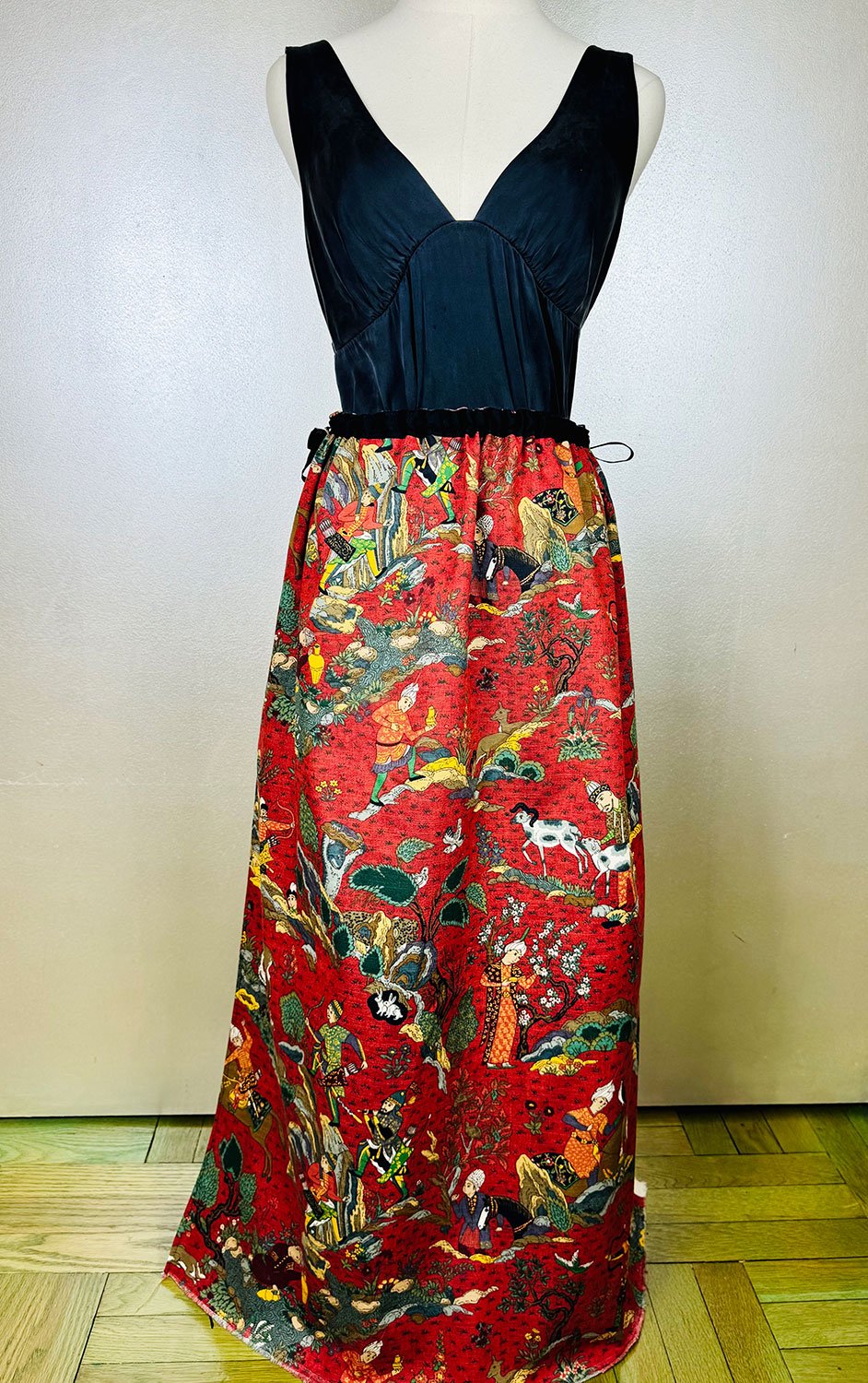 Piper overskirt on mannequin worn with bow detail