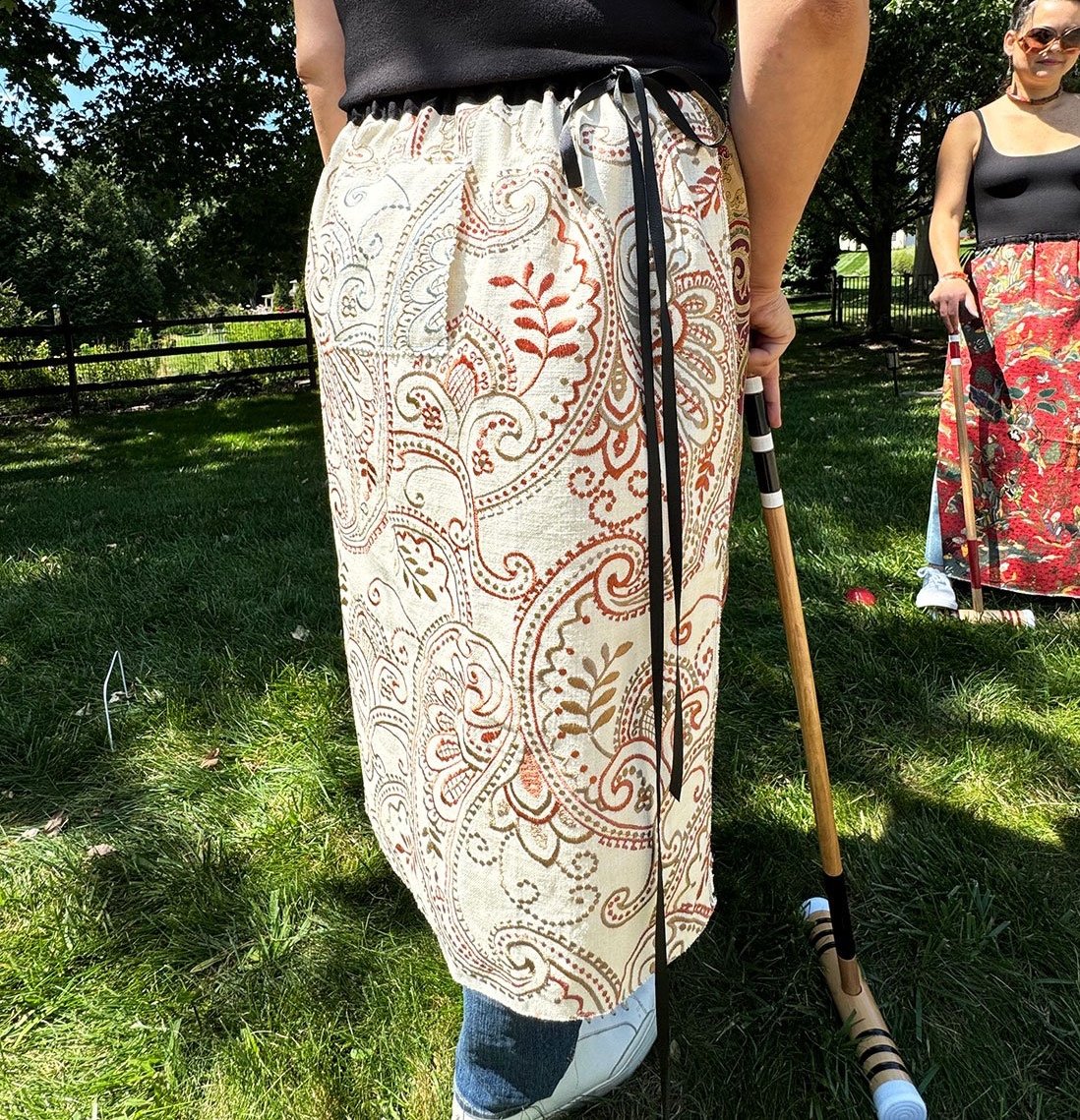 Piper overskirt on model back view skirt worn reversed