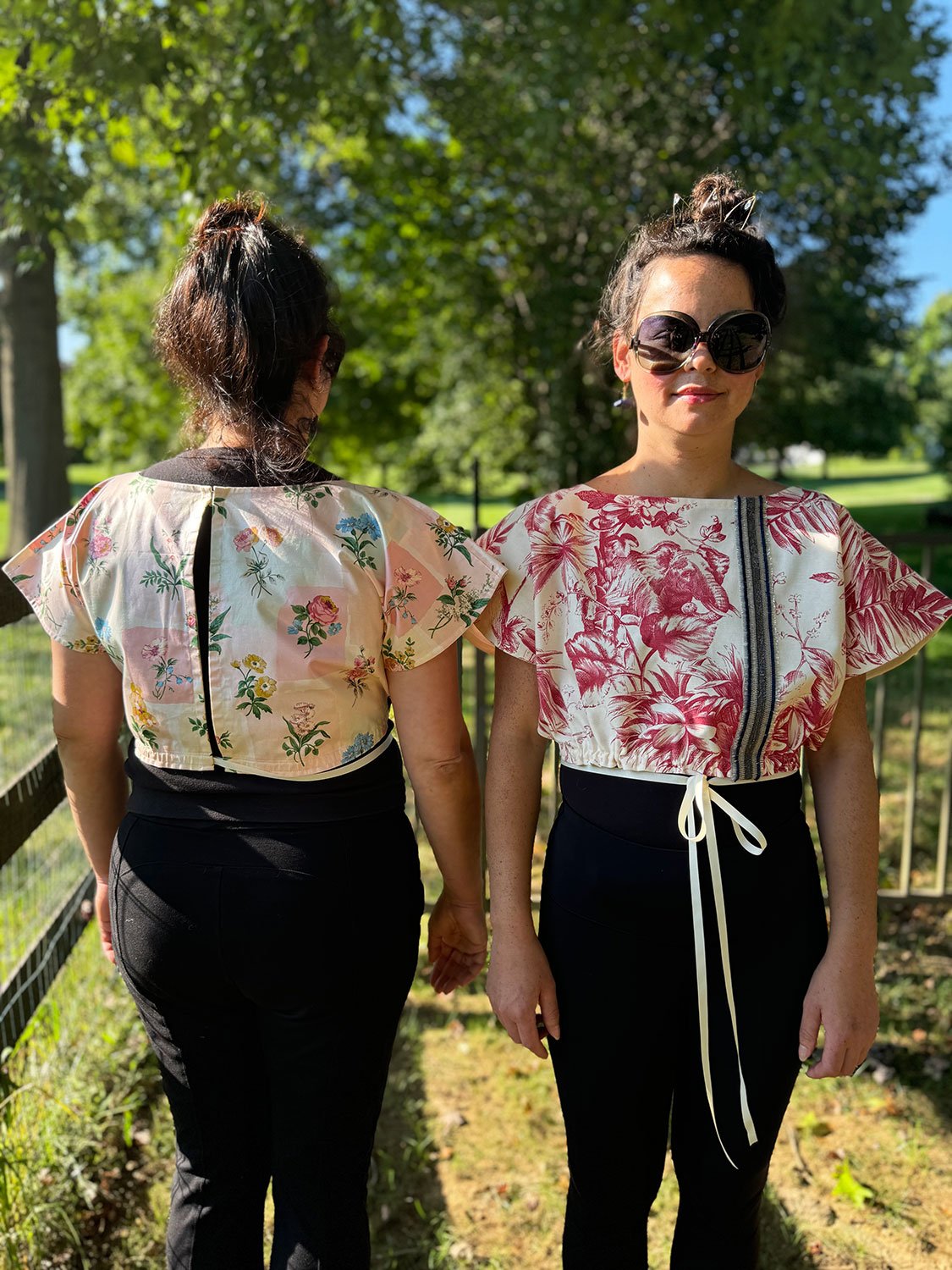 Frida Capelet pink coated chintz print on model back view with other model and jacket