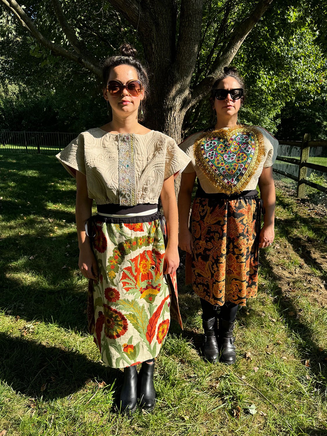 Frida Capelet with antique Sari fragment panel and Piper skirts/dress/cape worn on models front view
