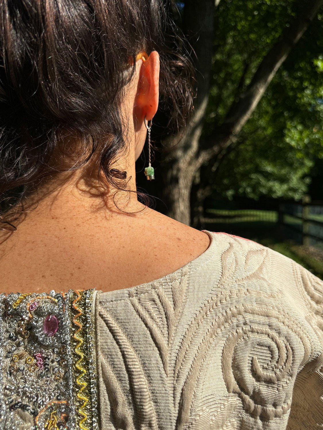 Frida Capelet with antique Sari fragment panels worn reversed on back on model close up and neckline