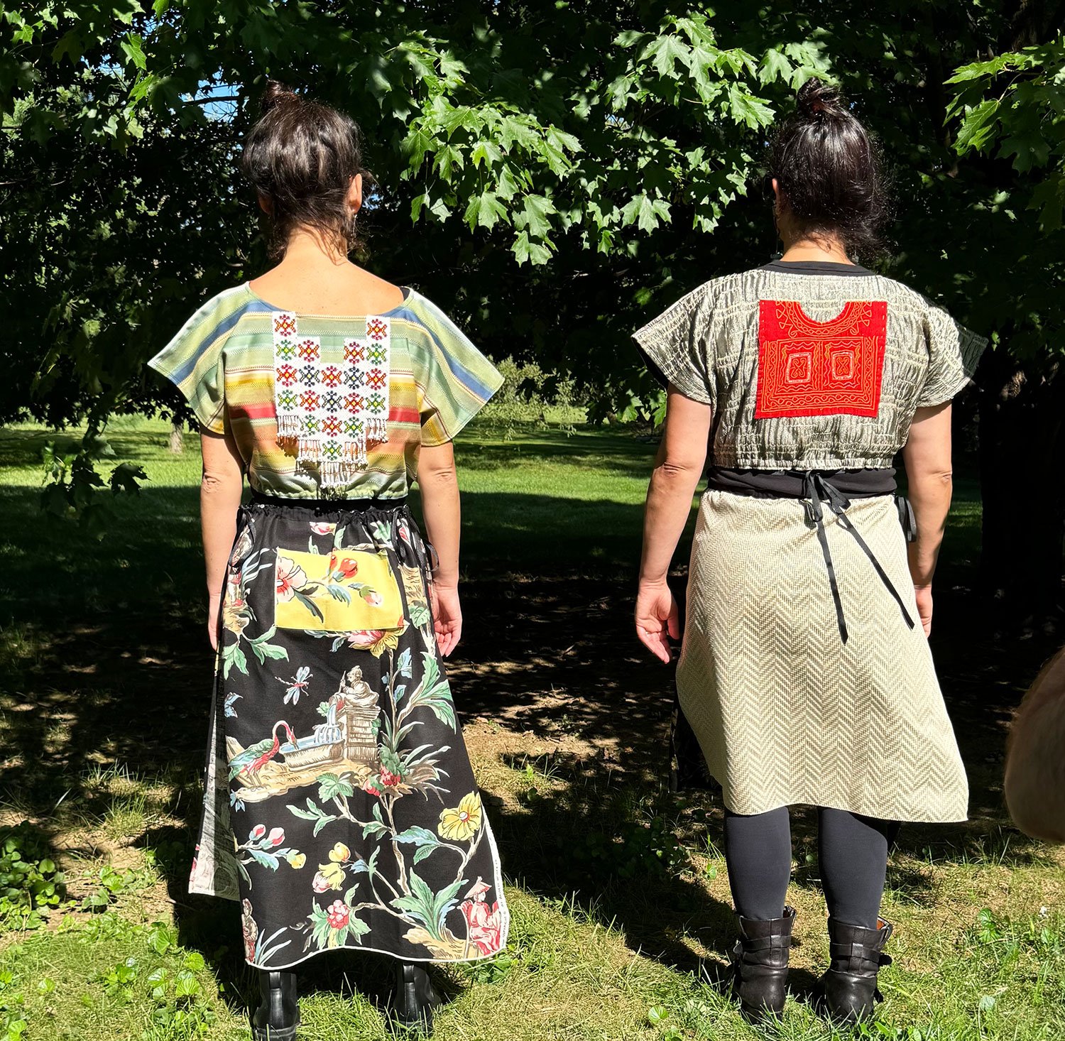 Frida Capelets with beaded and embroidered antique tribal panels and Piper skirts/dresses/capes on models standing backwards worn reversed