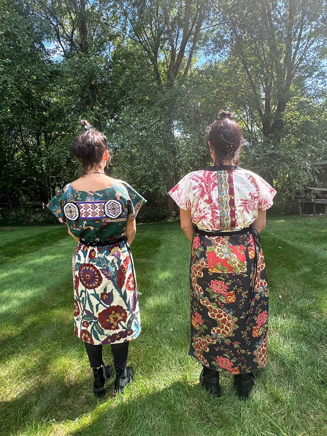 Frida Capelets with beaded antique tribal panels worn reversed and Piper skirt/cape/dress on models back view