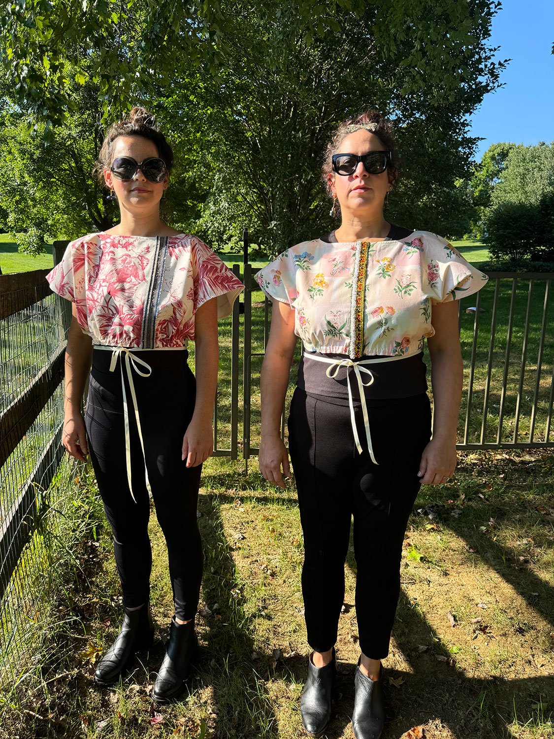 Frida Capelet pink coated chintz print on model front view with other model and jacket