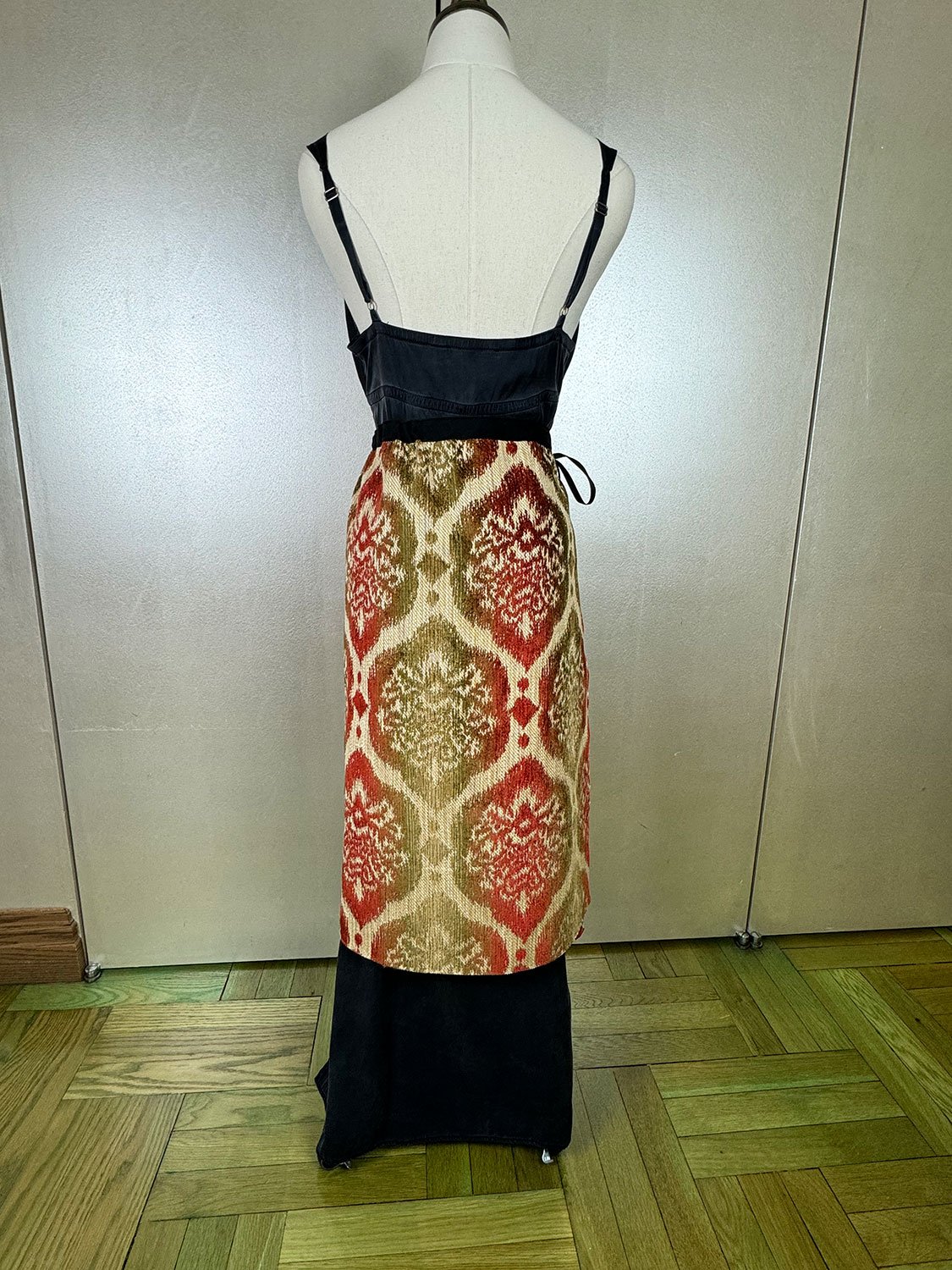 Piper overskirt on mannequin back view bow detail