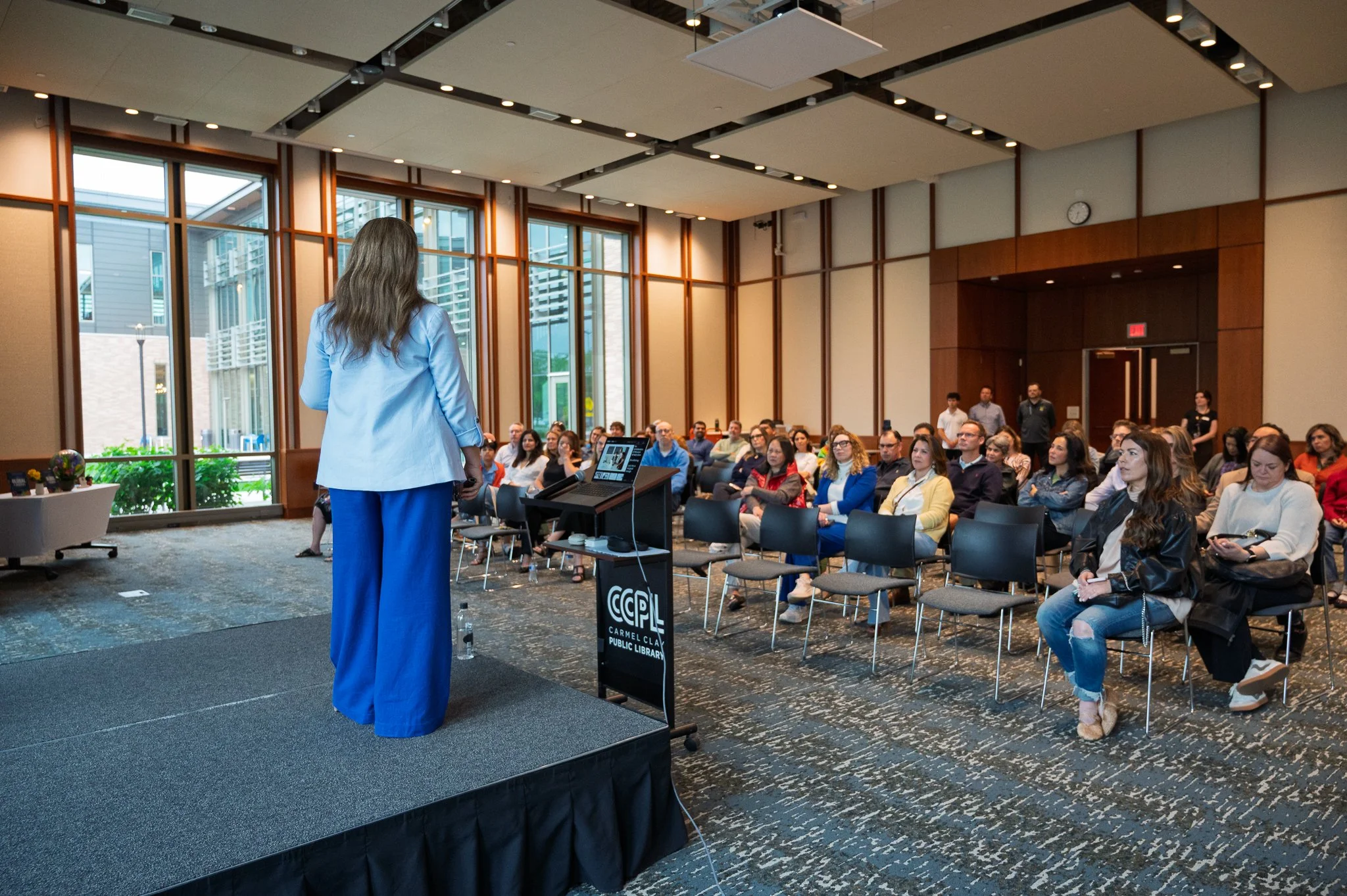 Author Toyi Rodriguez shares about her book "Global Citizen" with a crowd at the Carmel Clay Public Library