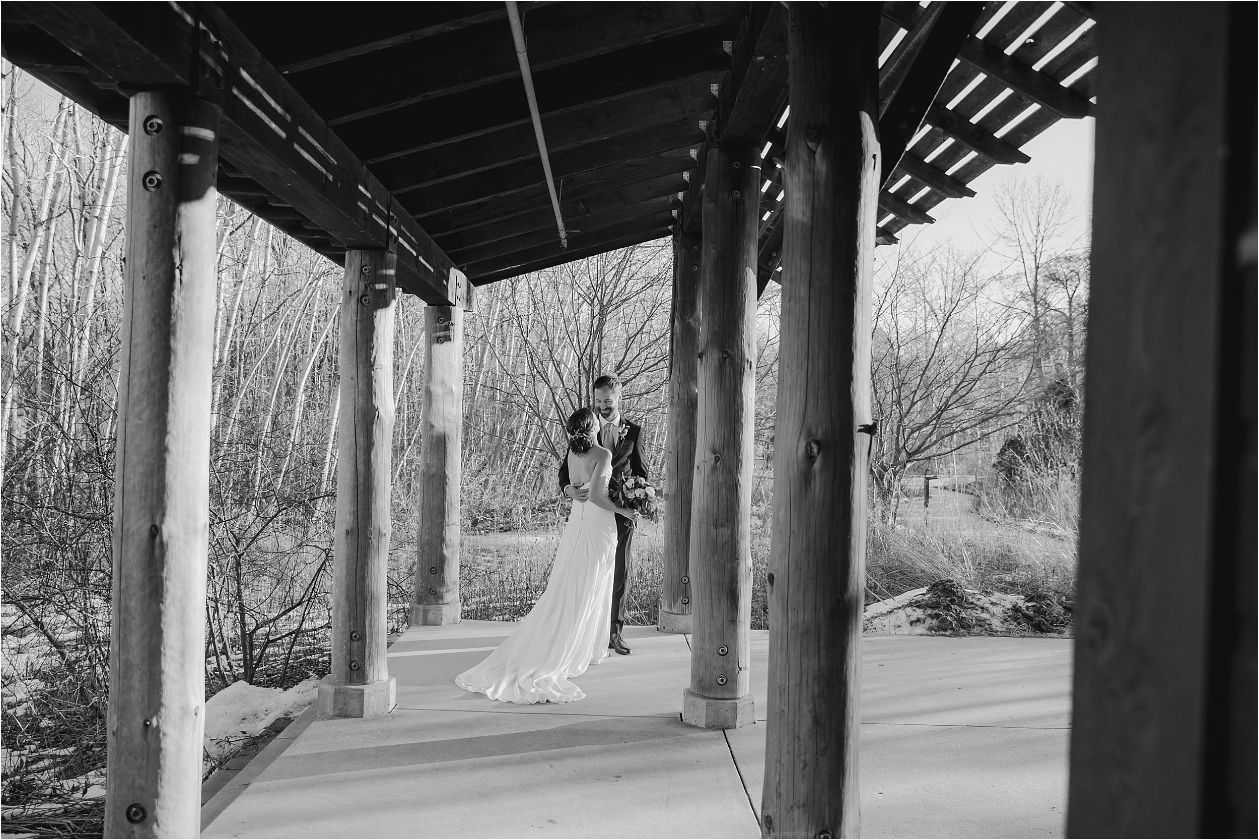 13-covered-nature-center-patio-bride-groom.JPG