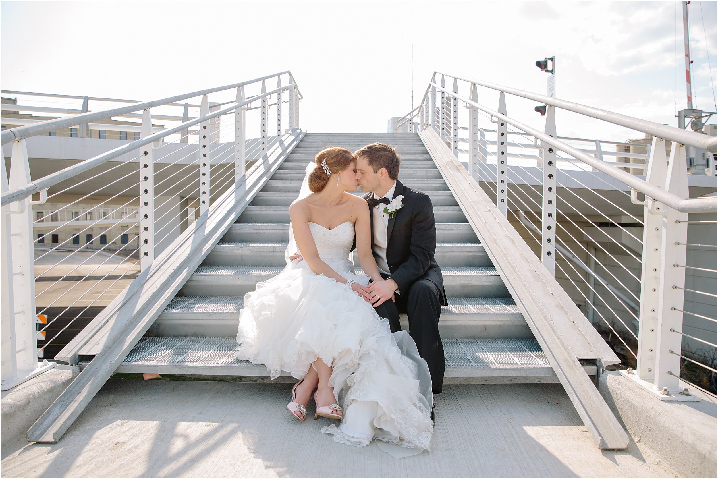 26-metal-stairs-seated-bridal-couple.JPG