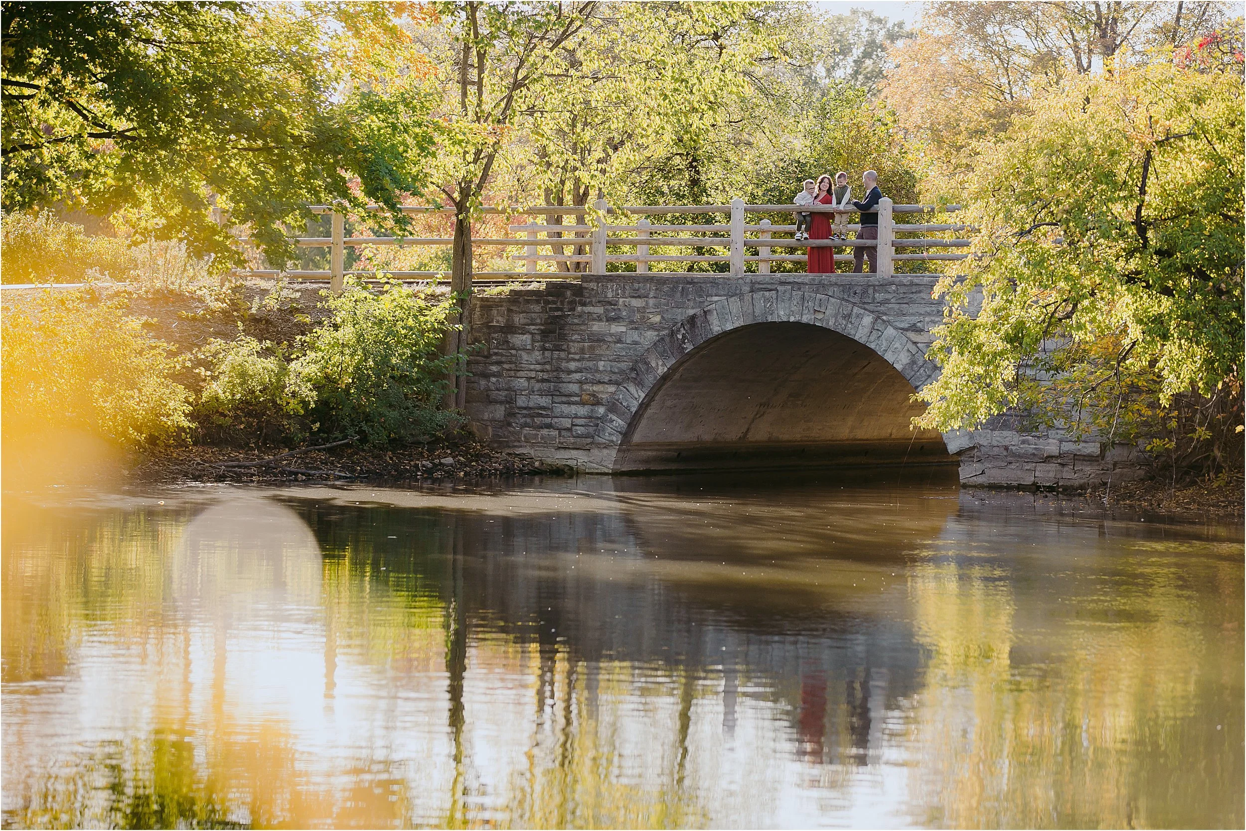 11-half-circle-bridge-yellow-reflection-fall-trees-fun-family-photos-brothers.JPG