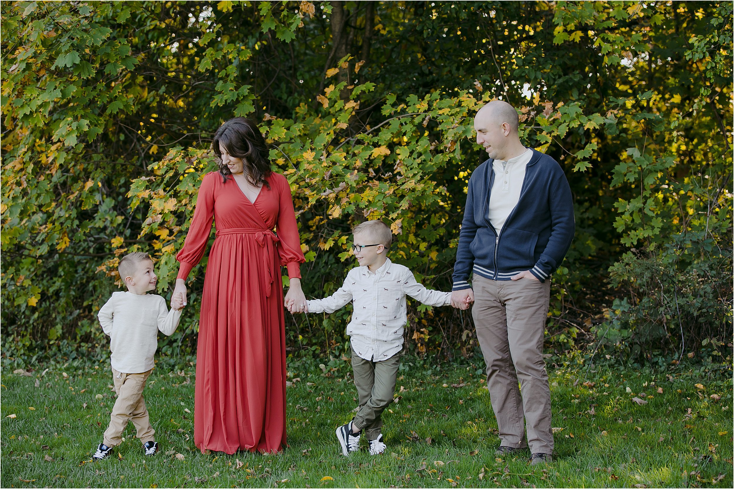 02-fall-trees-fun-family-photos-brothers-red-flowy-dress.JPG
