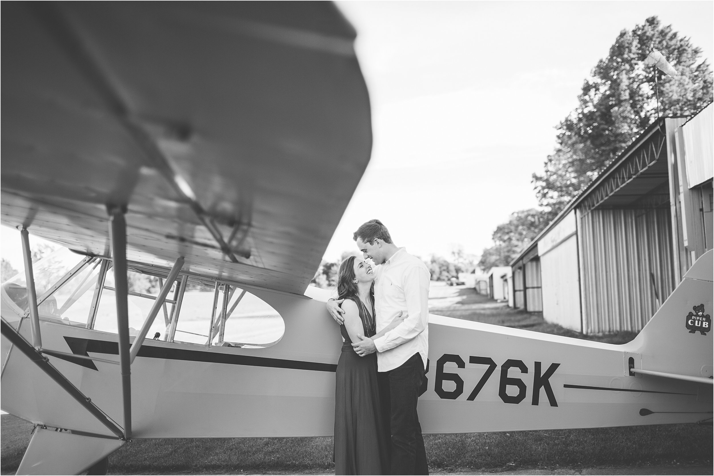 12-romantic-engaged-couple-posing-nature-airplane.JPG