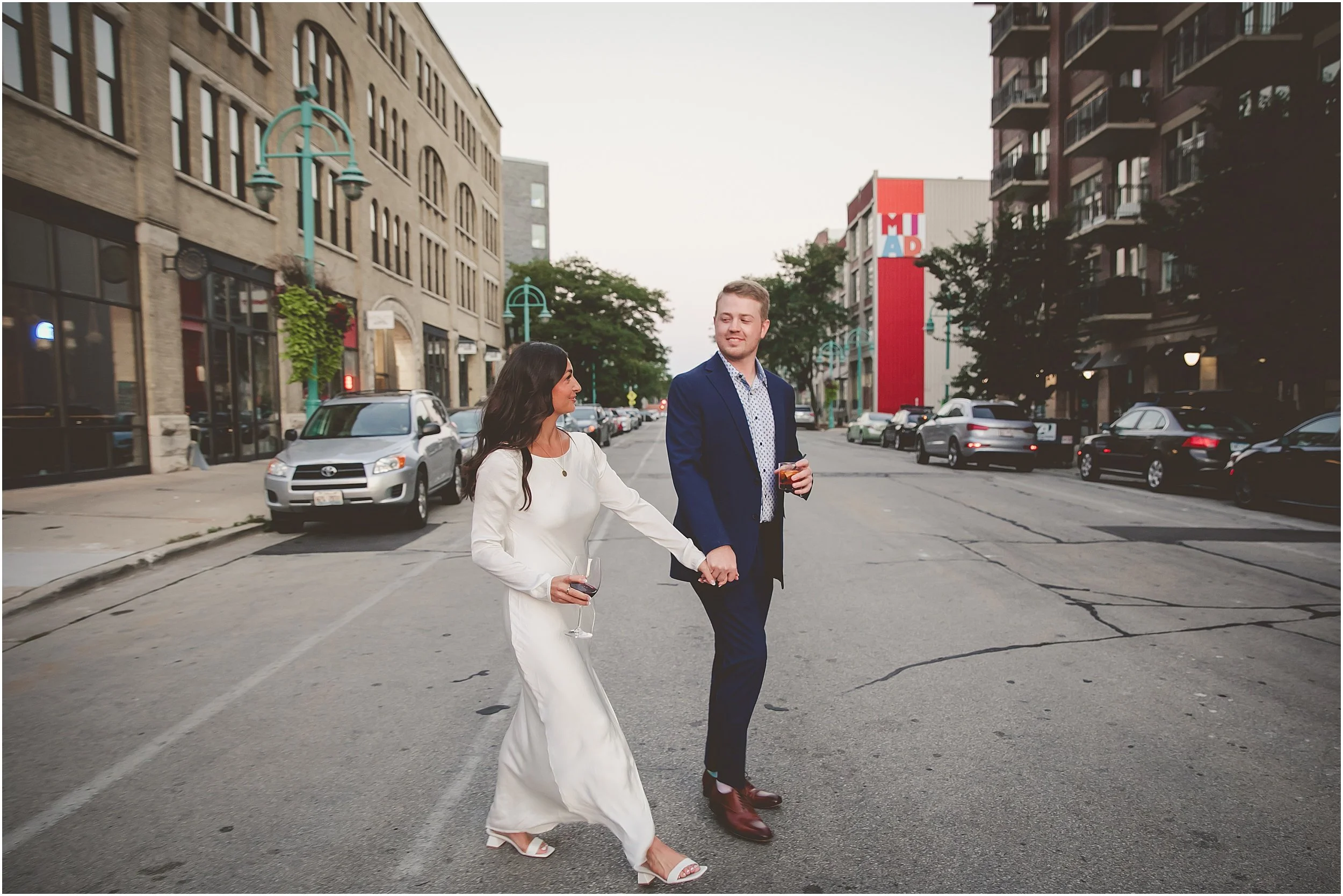 candid-editiorial-bride-groom-rehearsal-wine-apps-downtown-milwaukee.JPG