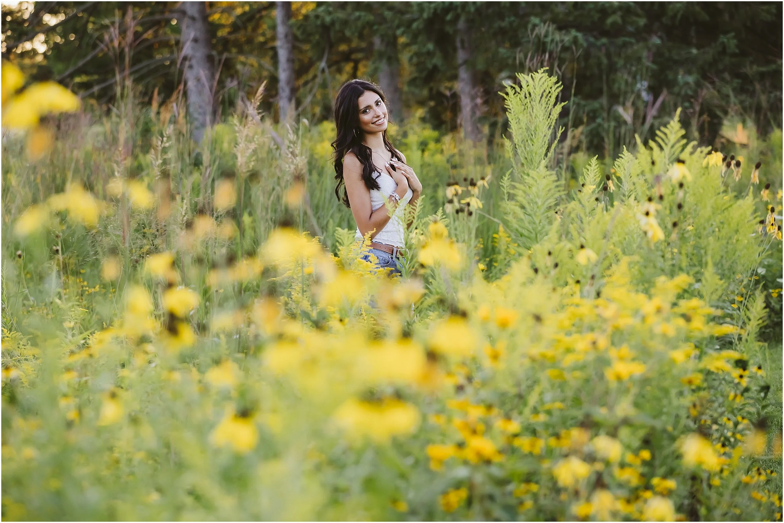 04-senior-shoot-sunset-golden-hour-flowers-fields-blue-hour-dark-haired-girl-white-tank-jean-shorts.JPG