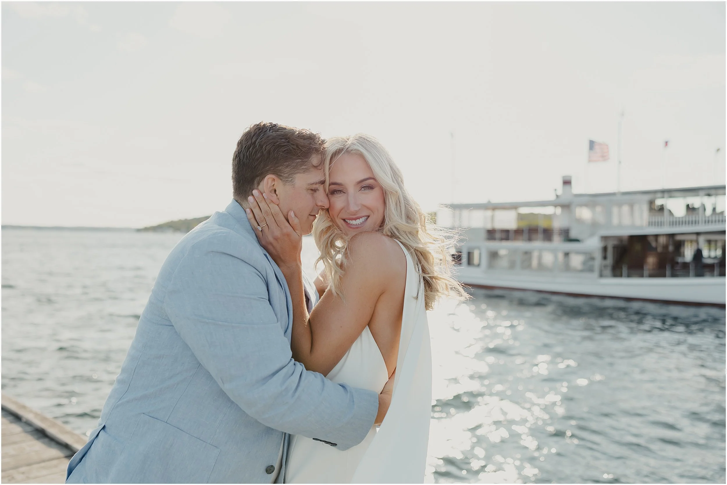 05-Lake-Geneva-boat-reheasal-sunset-cruise-bride-groom-blue-suit-white-dress-cape.JPG