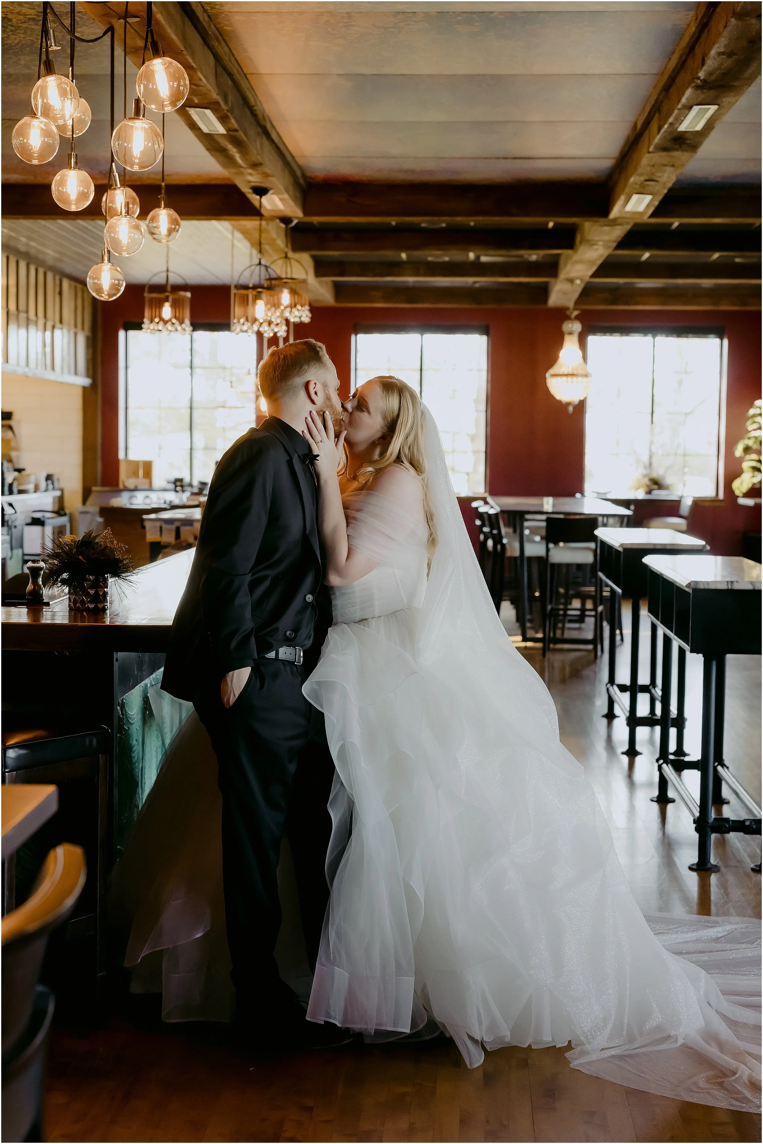 bride-kissing-groom-bar.JPG