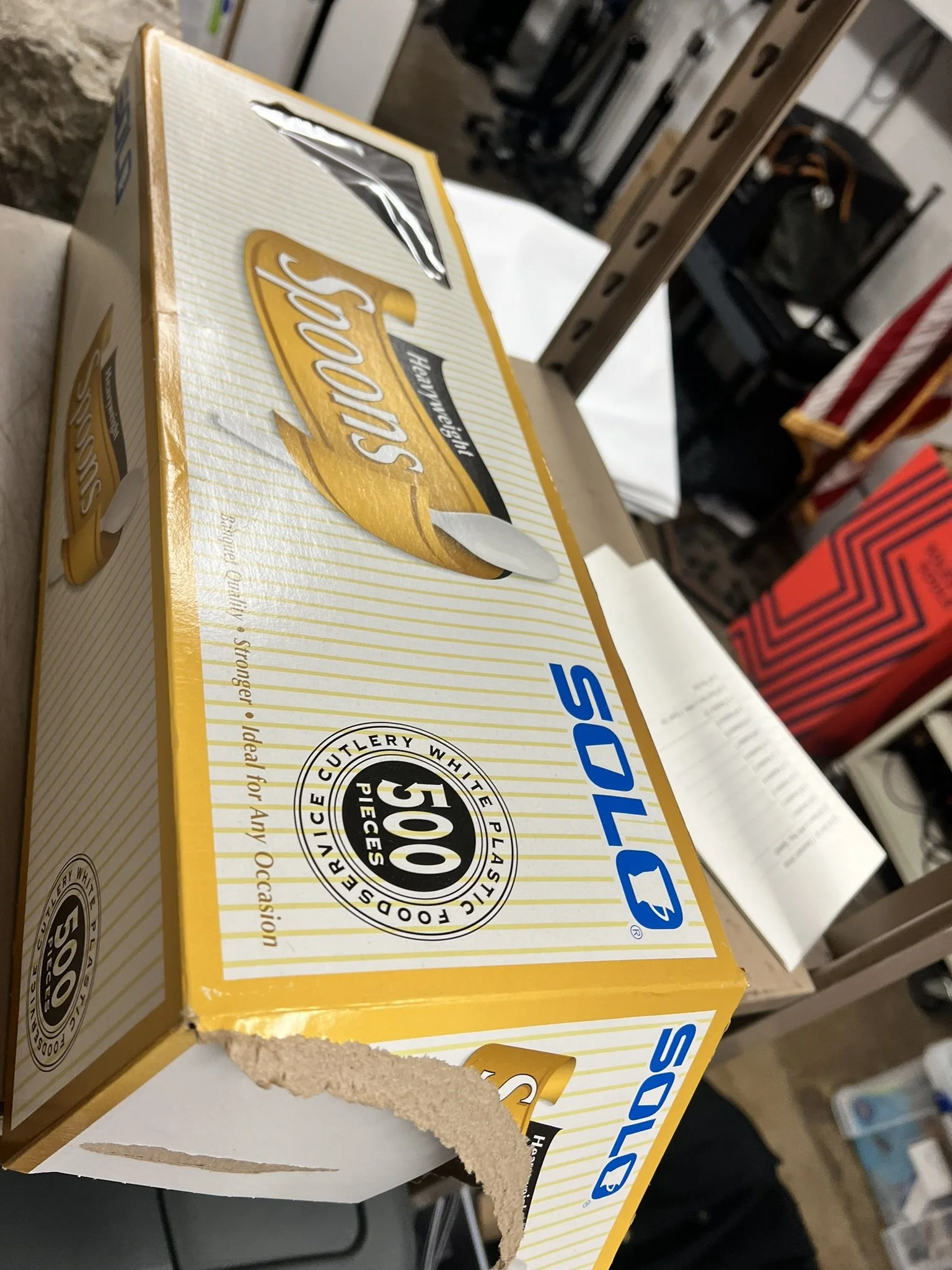 Box of plastic spoons