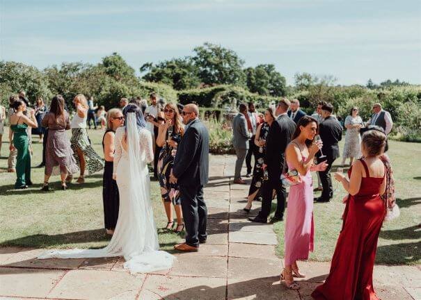 wedding-guests-drinks-reception-butley-priory-suffolk.jpg