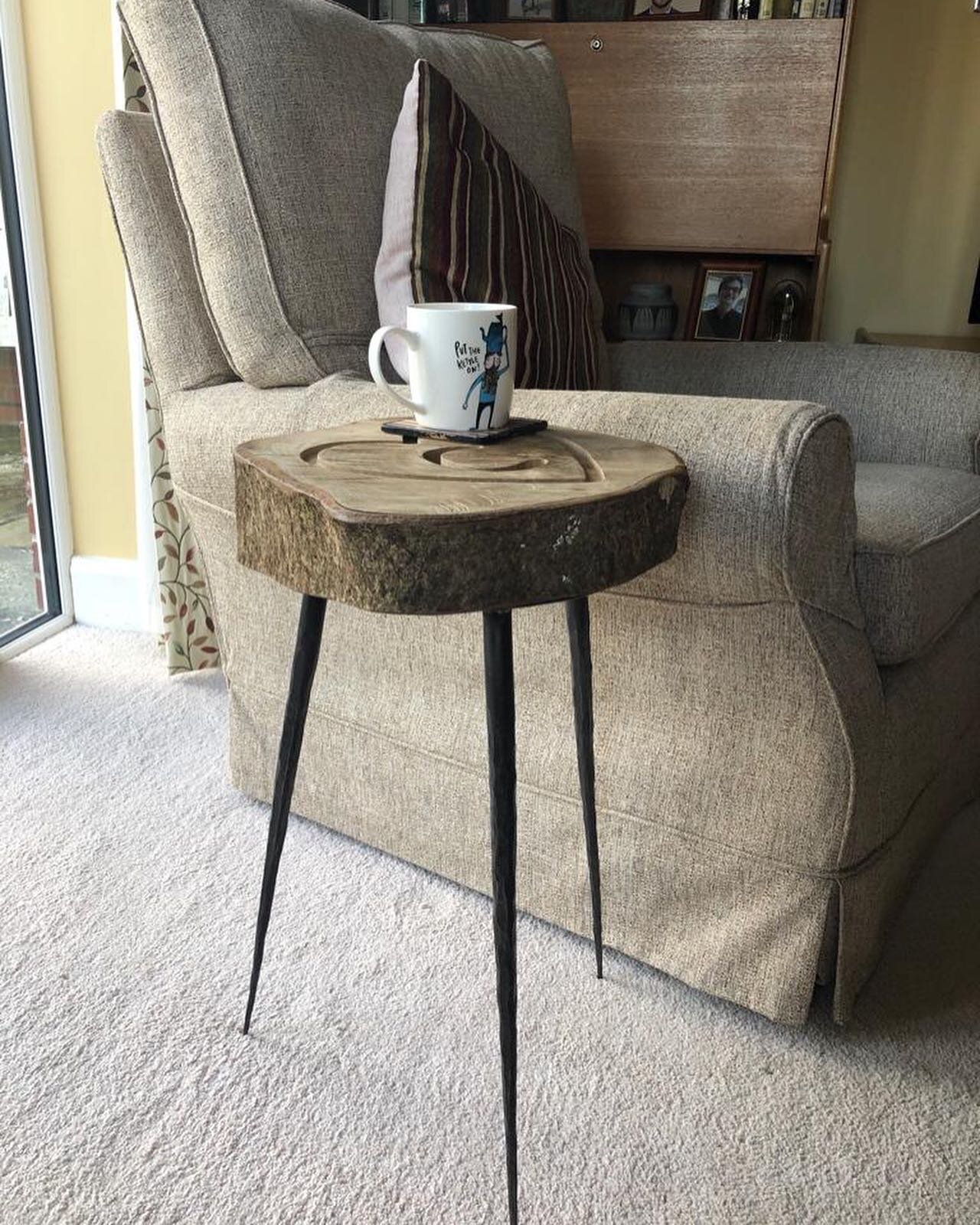 This piece of walnut was cut from a tree planted by Colin Mackenzie over 40 years ago. Today it has been carved with the letter C and I have added forged legs so that it can be enjoyed everyday in his memory. #table #blacksmith #walnut #multimedia #f