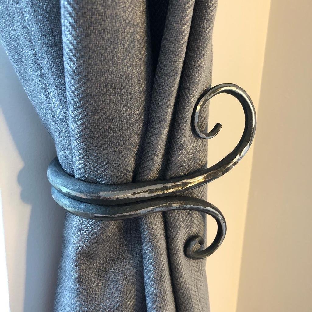 Hand forged steel curtain tie back