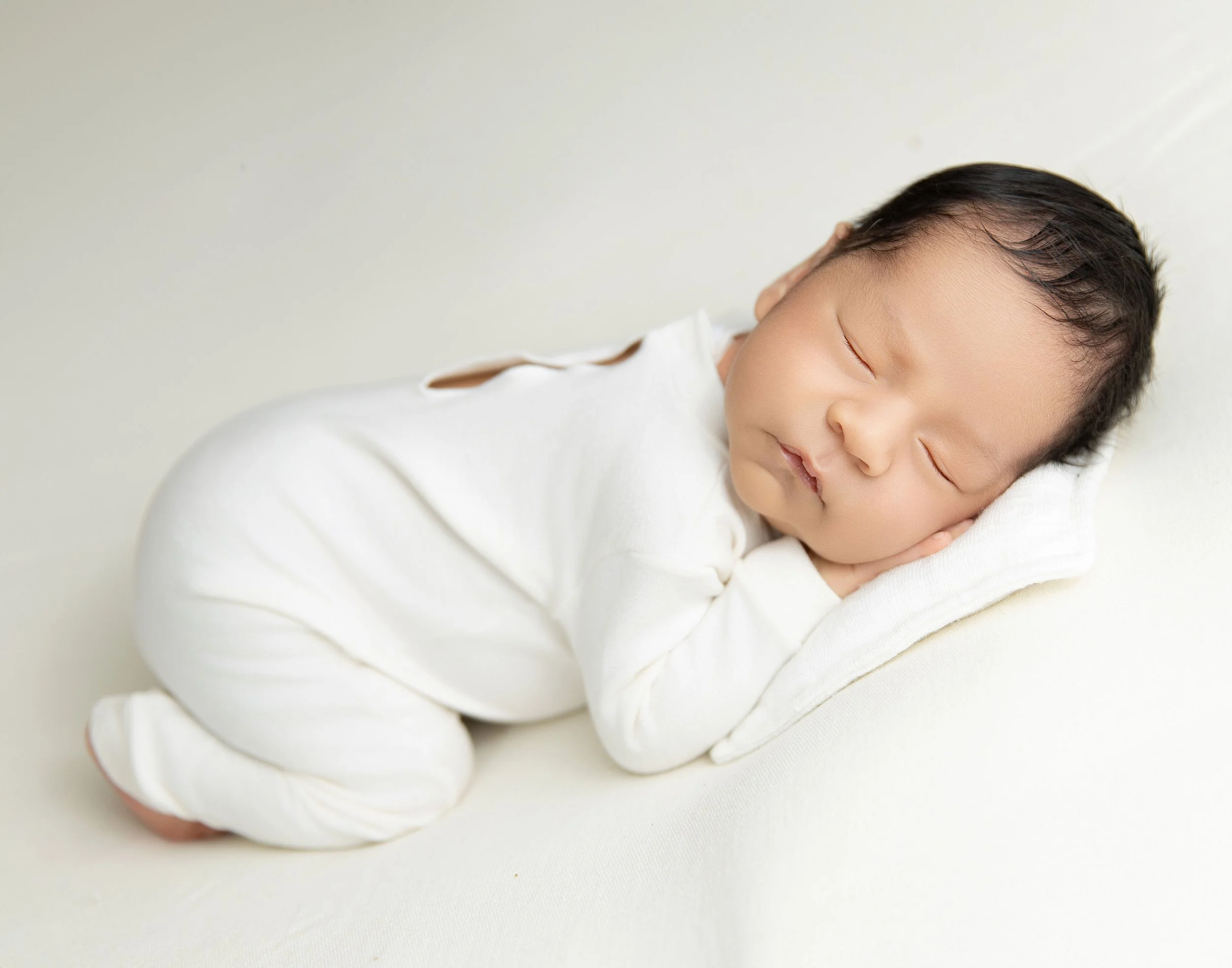 Timeless white newborn portrait by Palm Desert newborn photographer Melissa Winn Photography
