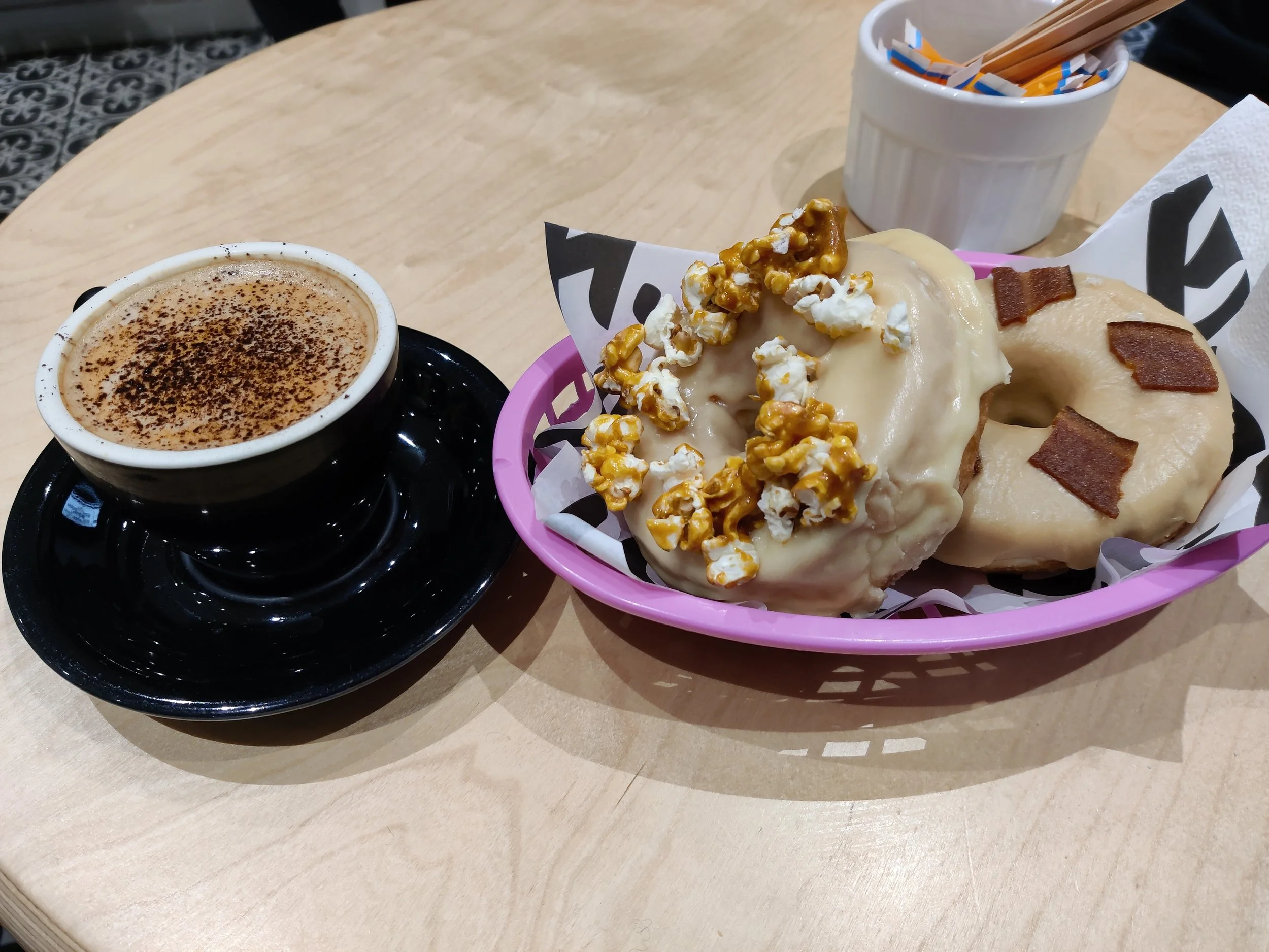 Boneshaker Donuts - English toffee popcorn with salted caramel, maple bacon