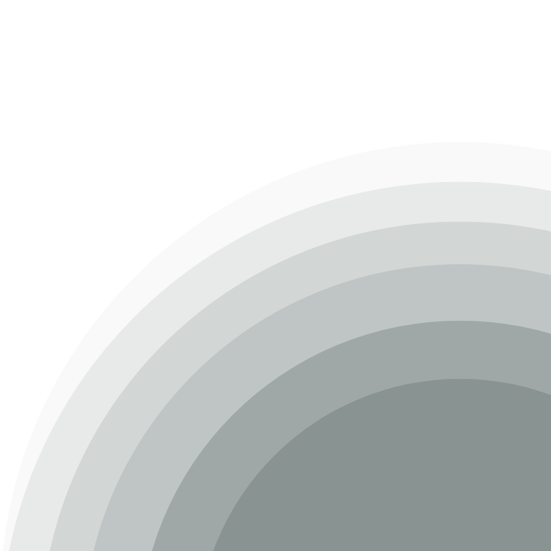 Silhouette of a person sitting on a bench, looking at a laptop, with a cityscape background.