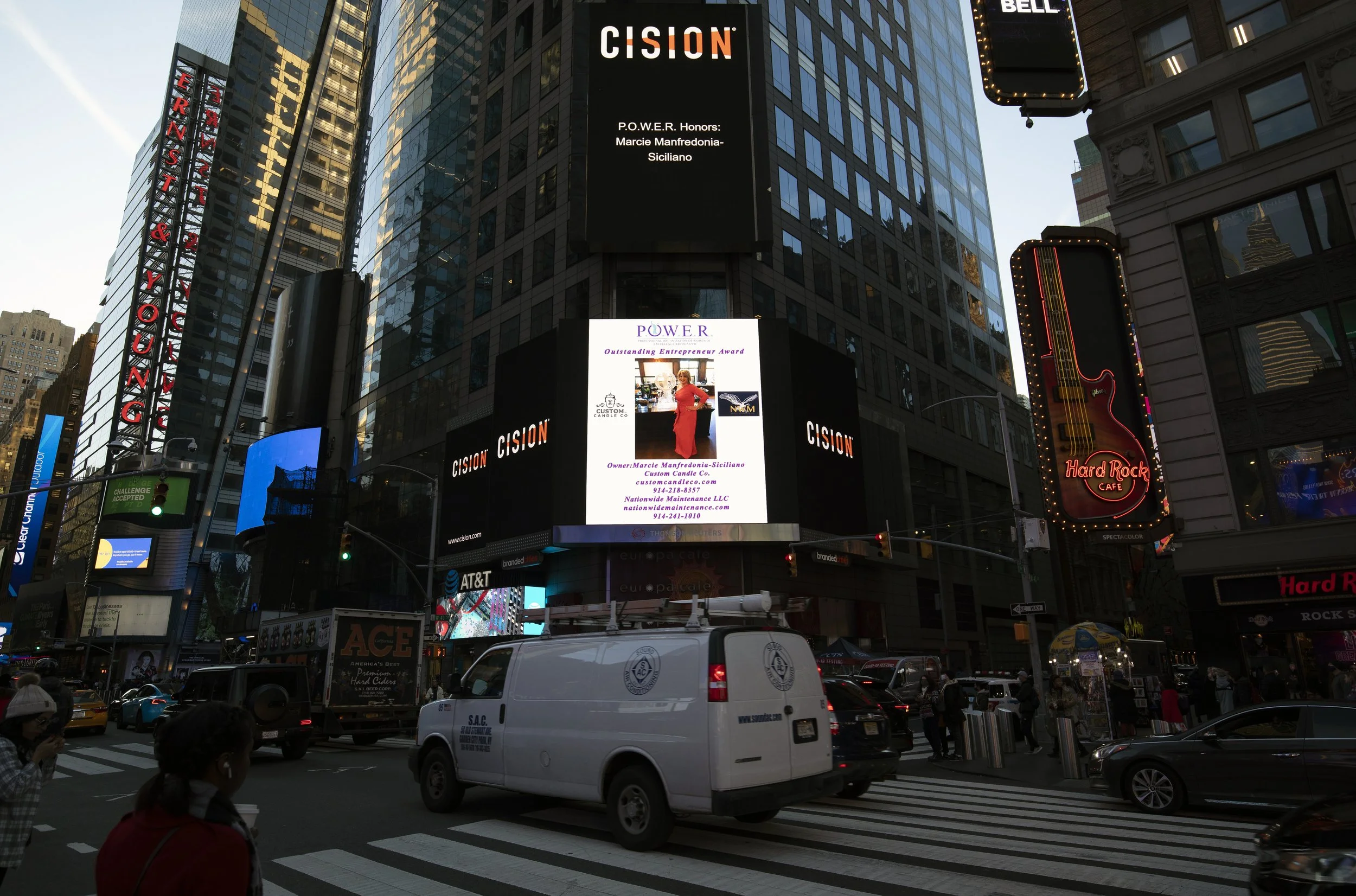 Marcie Manfredonia on Jumbotron in Times Square (New York City) announcing her P.O.W.E.R. Outstanding Entrepreneur Award 