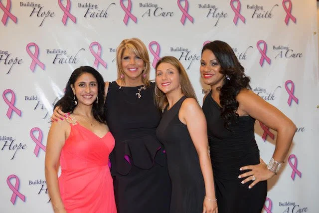 Marcie and three lovely ladies posing at the Breast Cancer Building Hope event