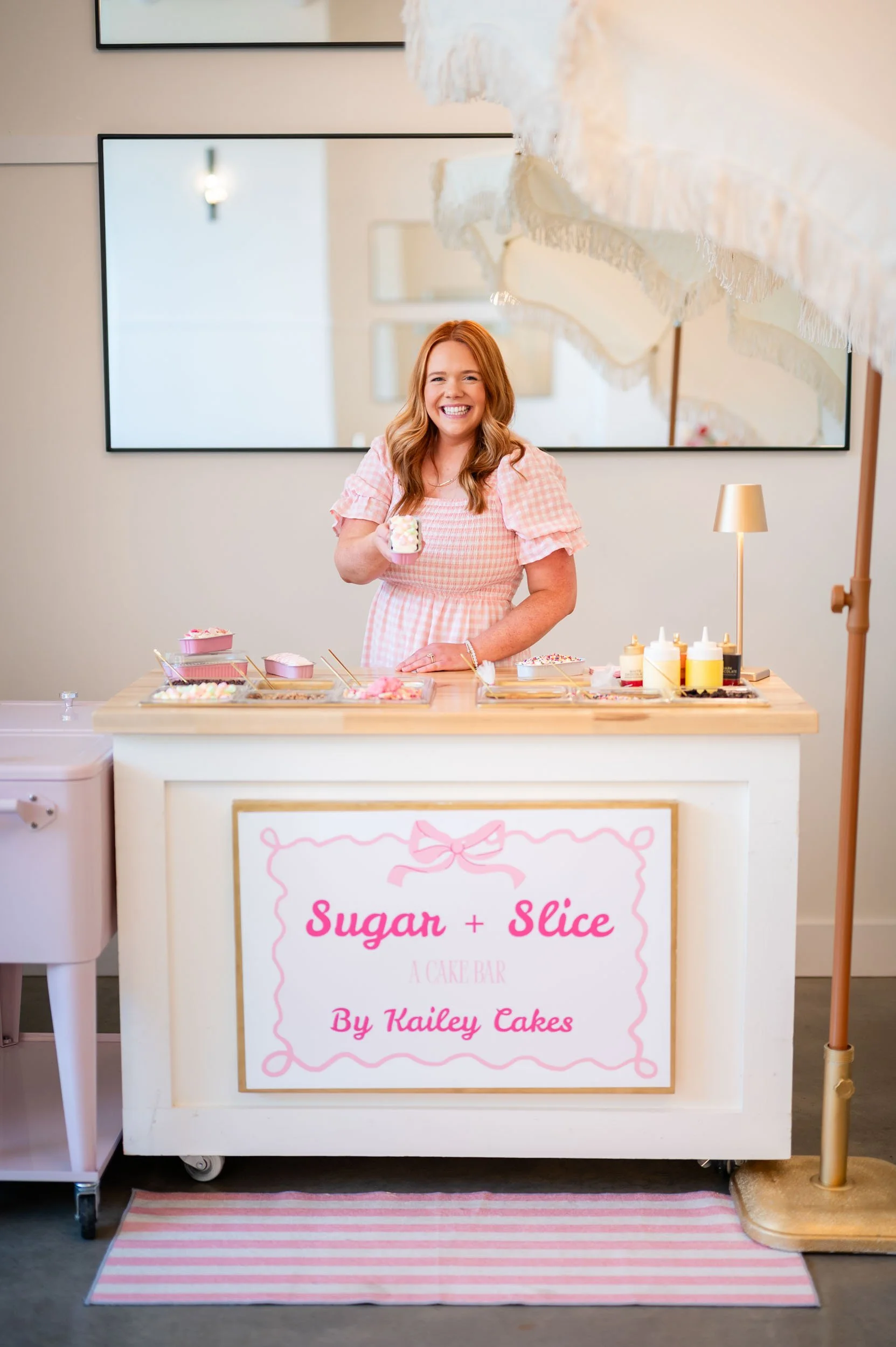 Custom cake decorating station for wedding guests at Southall Meadows Franklin, TN