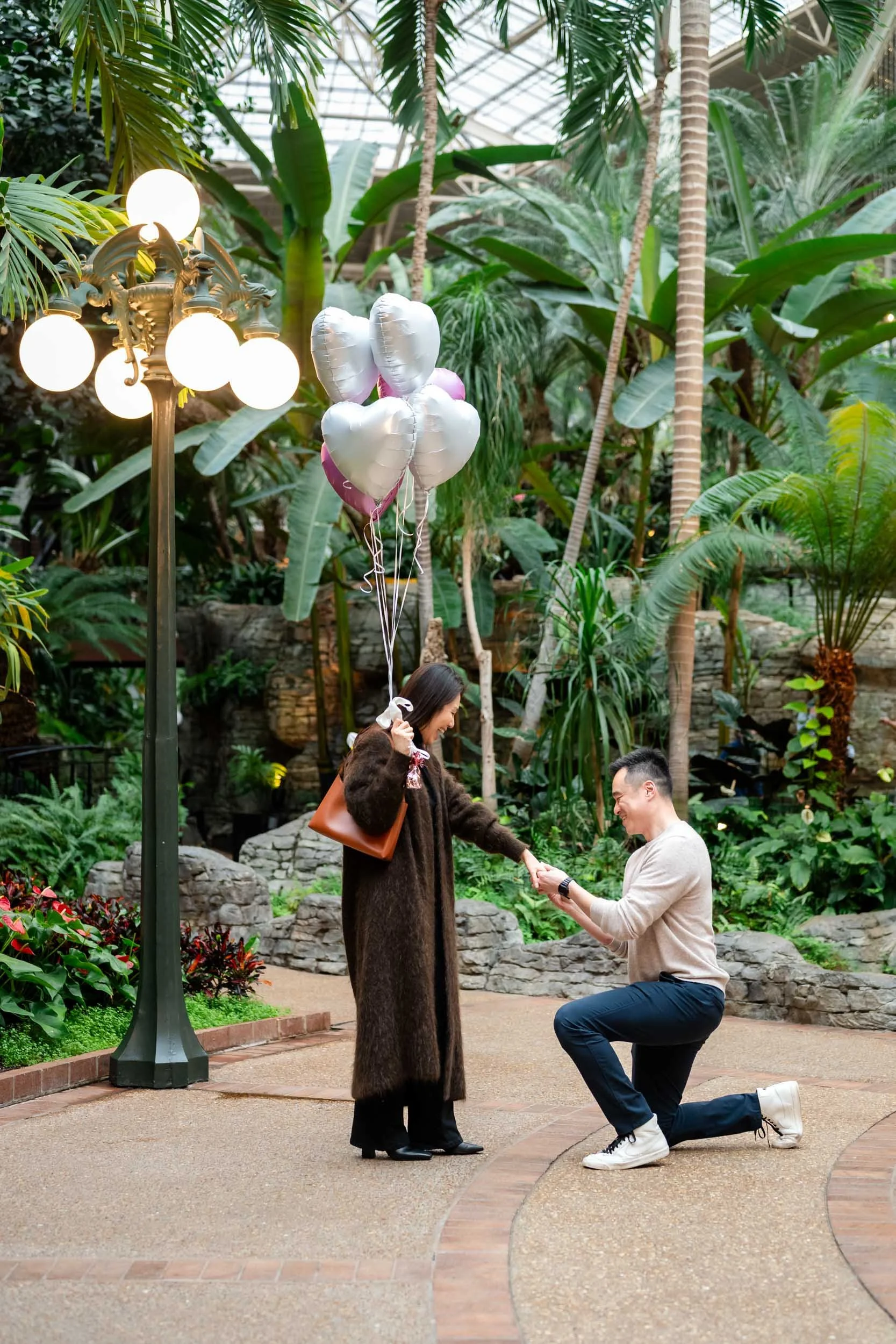 Gaylord Opryland Resort & Convention Center Proposal Engagement Photos Guy proposing to girl