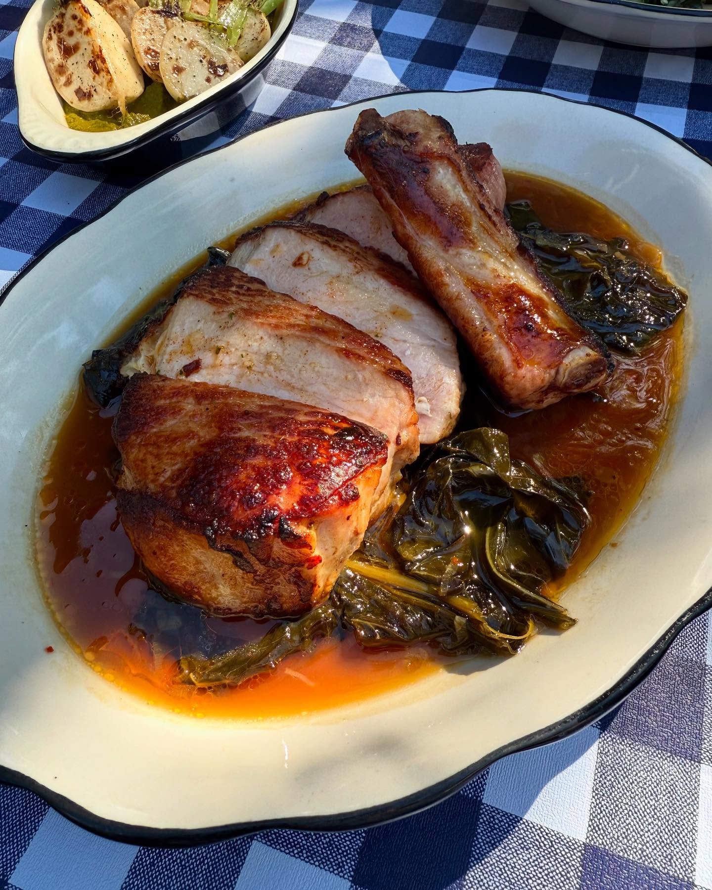 A few beautiful standouts from the current menu (big pork chop &amp; collards, spring salad, potato-crusted flounder, seasonal cocktails, turnips, steak &amp; crab) + a reminder that the patio is open (when the weather is nice) &amp; angelic/polite d